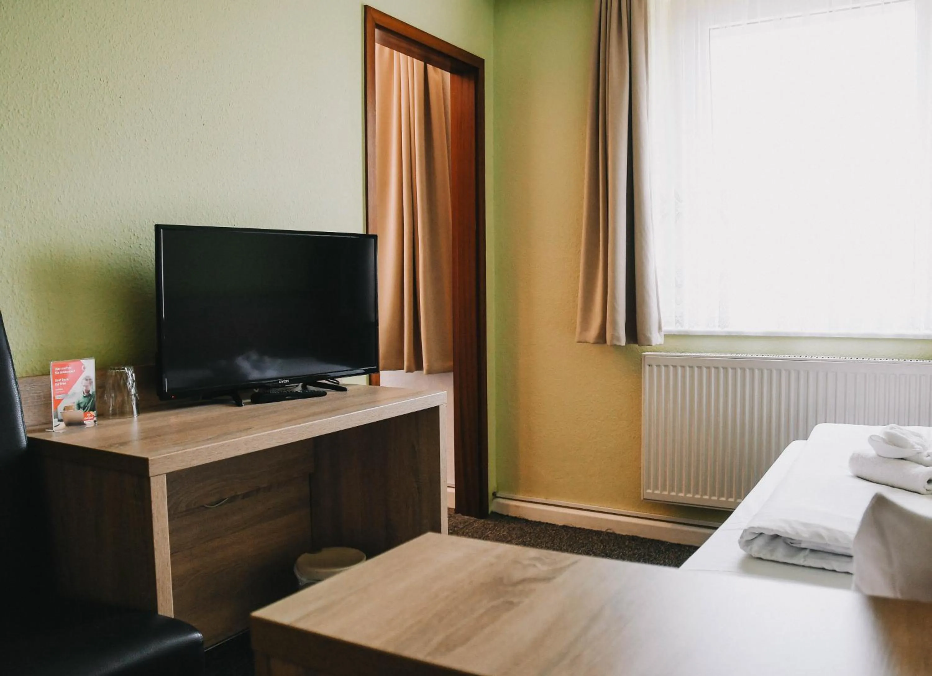 TV and multimedia, Bed in Hotel-Pension ODIN