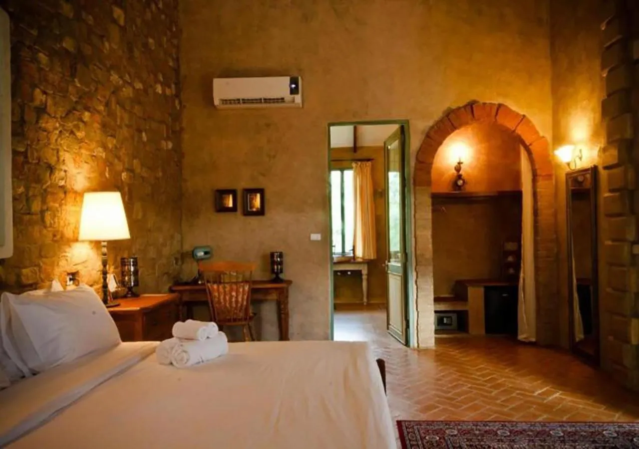 Photo of the whole room, Bed in La Toscana