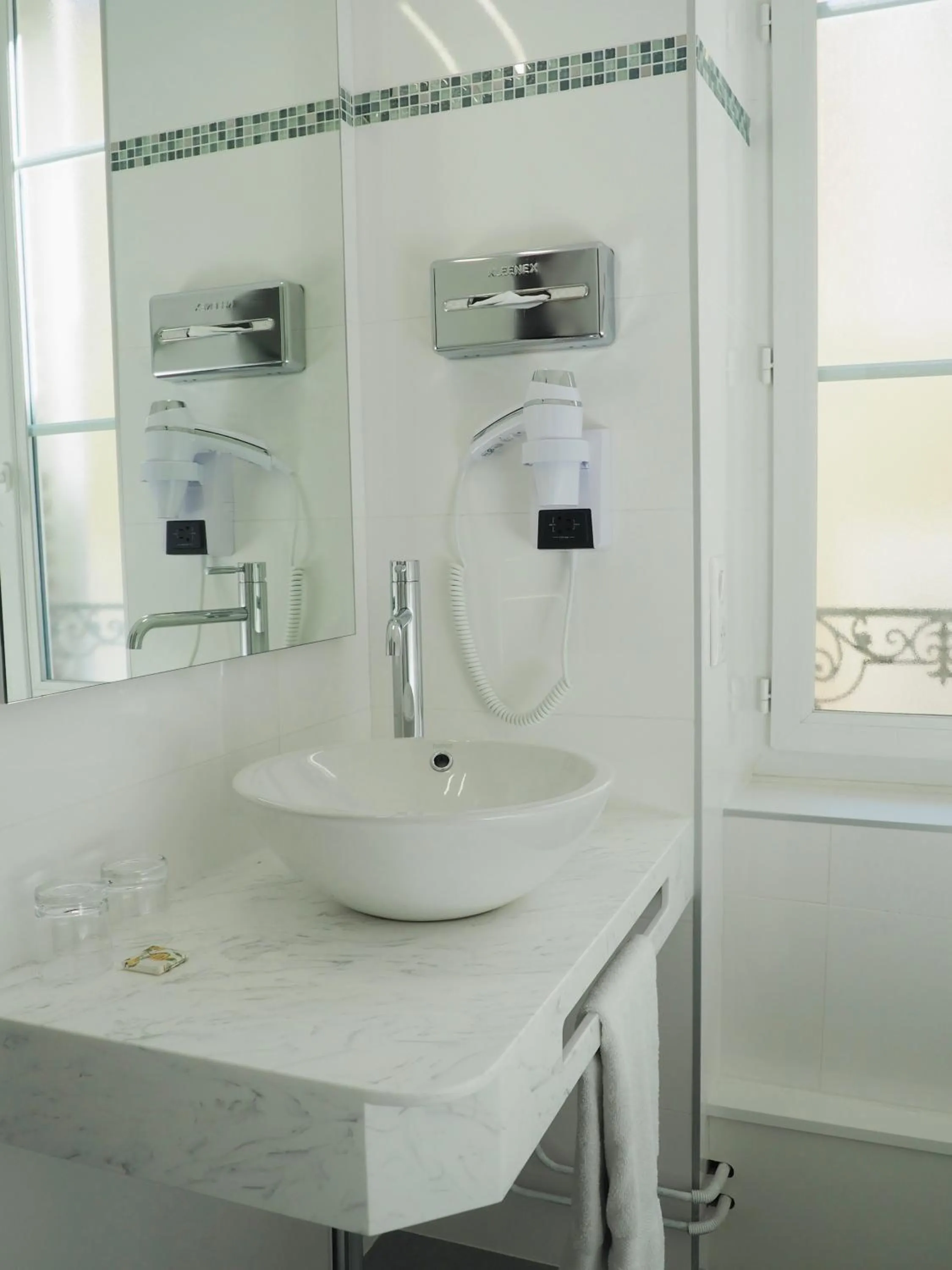Bathroom in Logis Hotel Royal Saint-Mart
