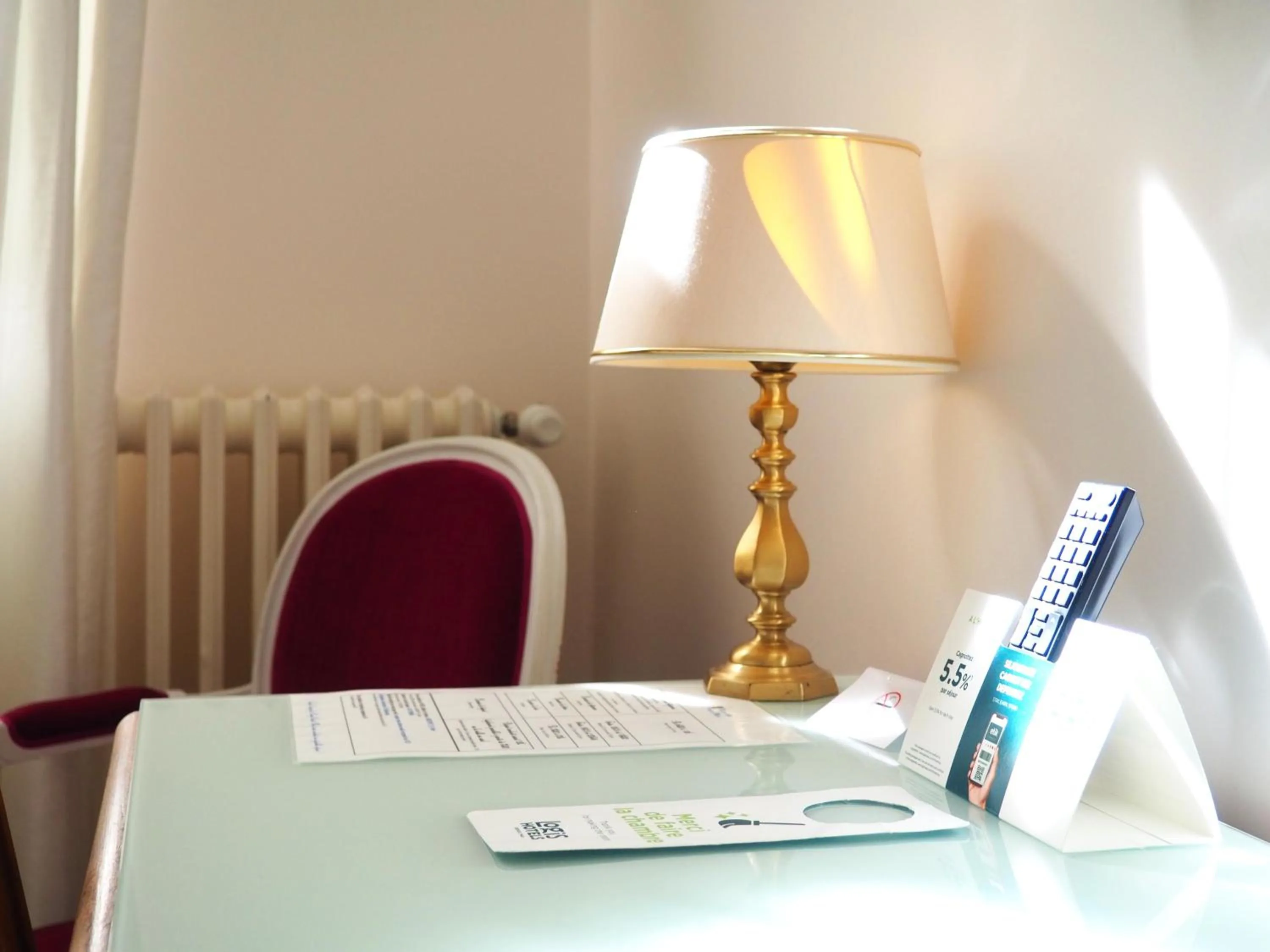 Bedroom in Logis Hotel Royal Saint-Mart