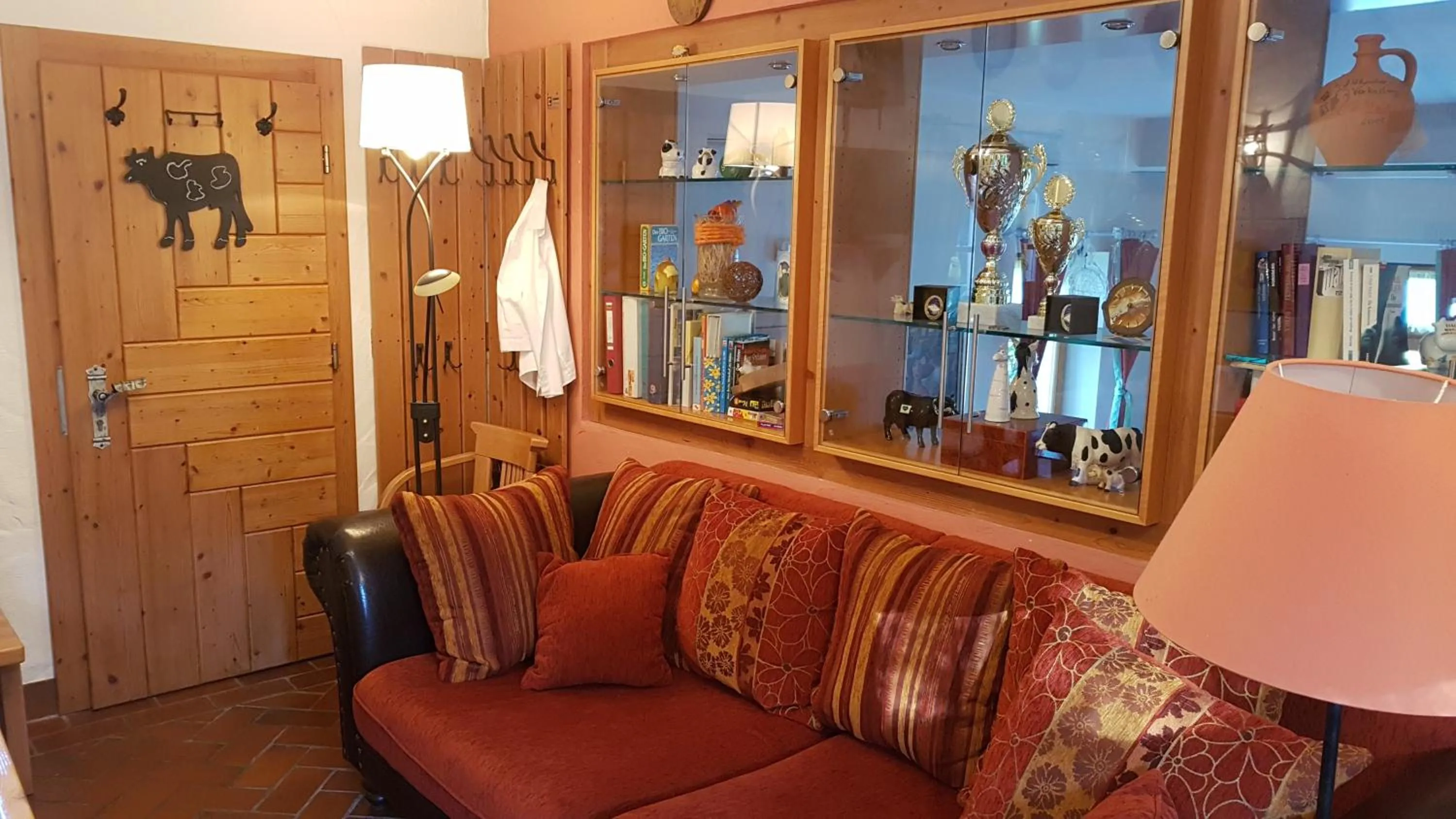 Communal lounge/ TV room in FerienAppartments Landhaus FühlDichWohl