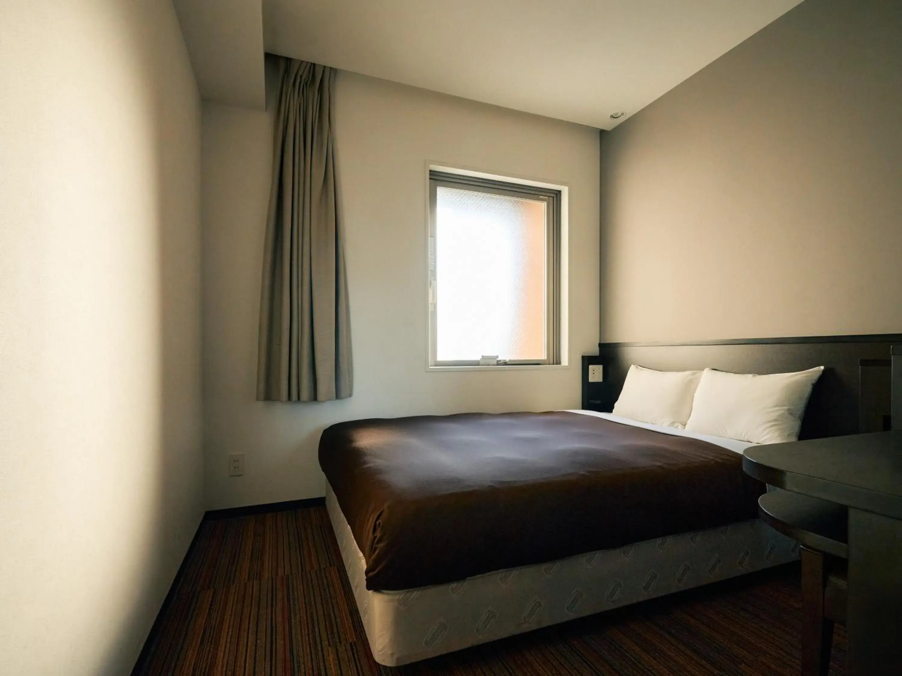 Bed in Urbain Tokyo Ueno Kitasenju Bed in Urbain Tokyo Ueno Kitasenju