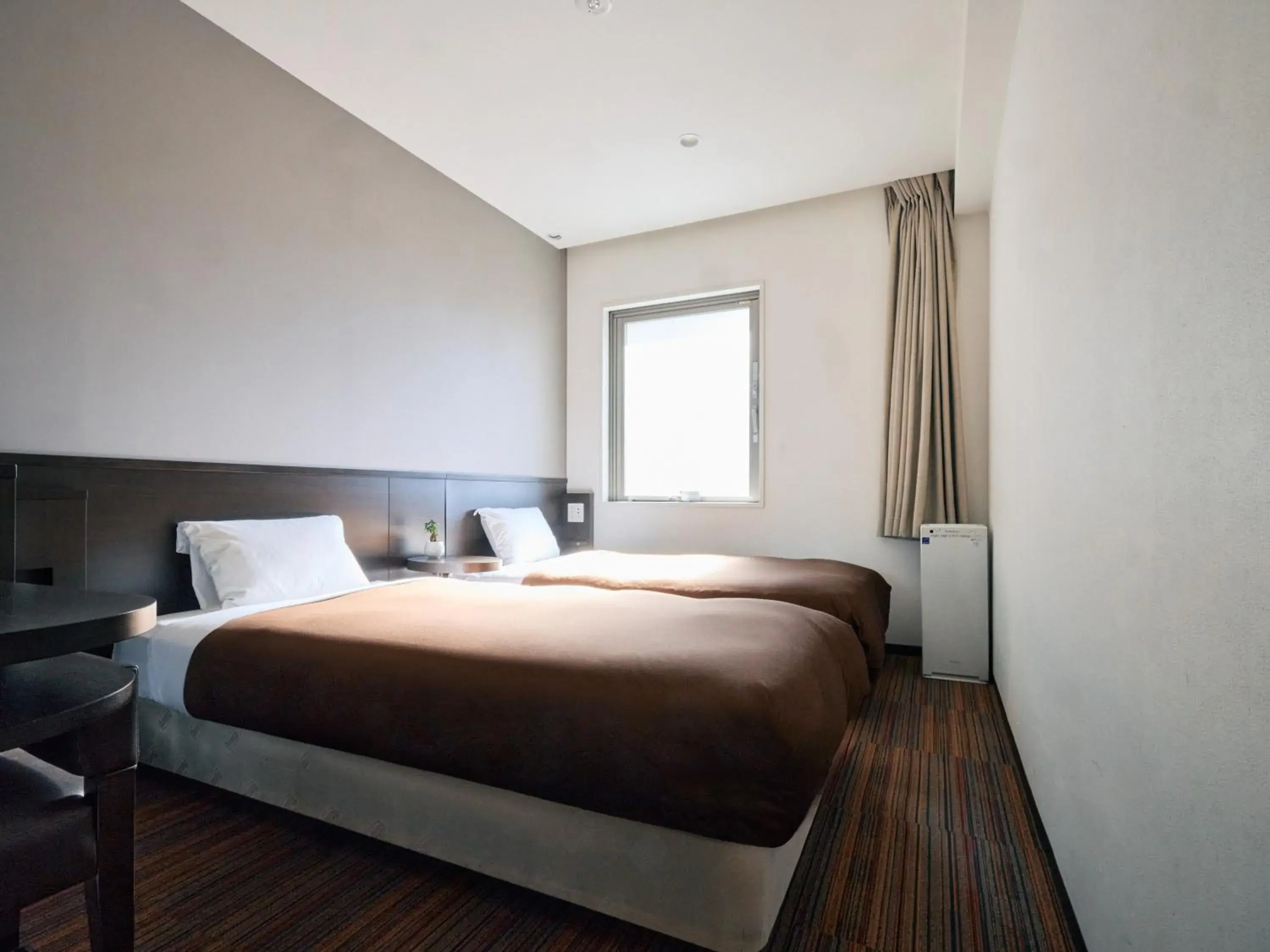 Bed in Urbain Tokyo Ueno Kitasenju Bed in Urbain Tokyo Ueno Kitasenju