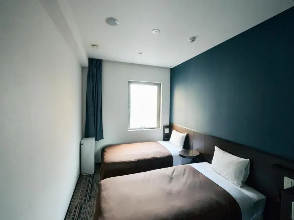 Bed in Urbain Tokyo Ueno Kitasenju Bed in Urbain Tokyo Ueno Kitasenju