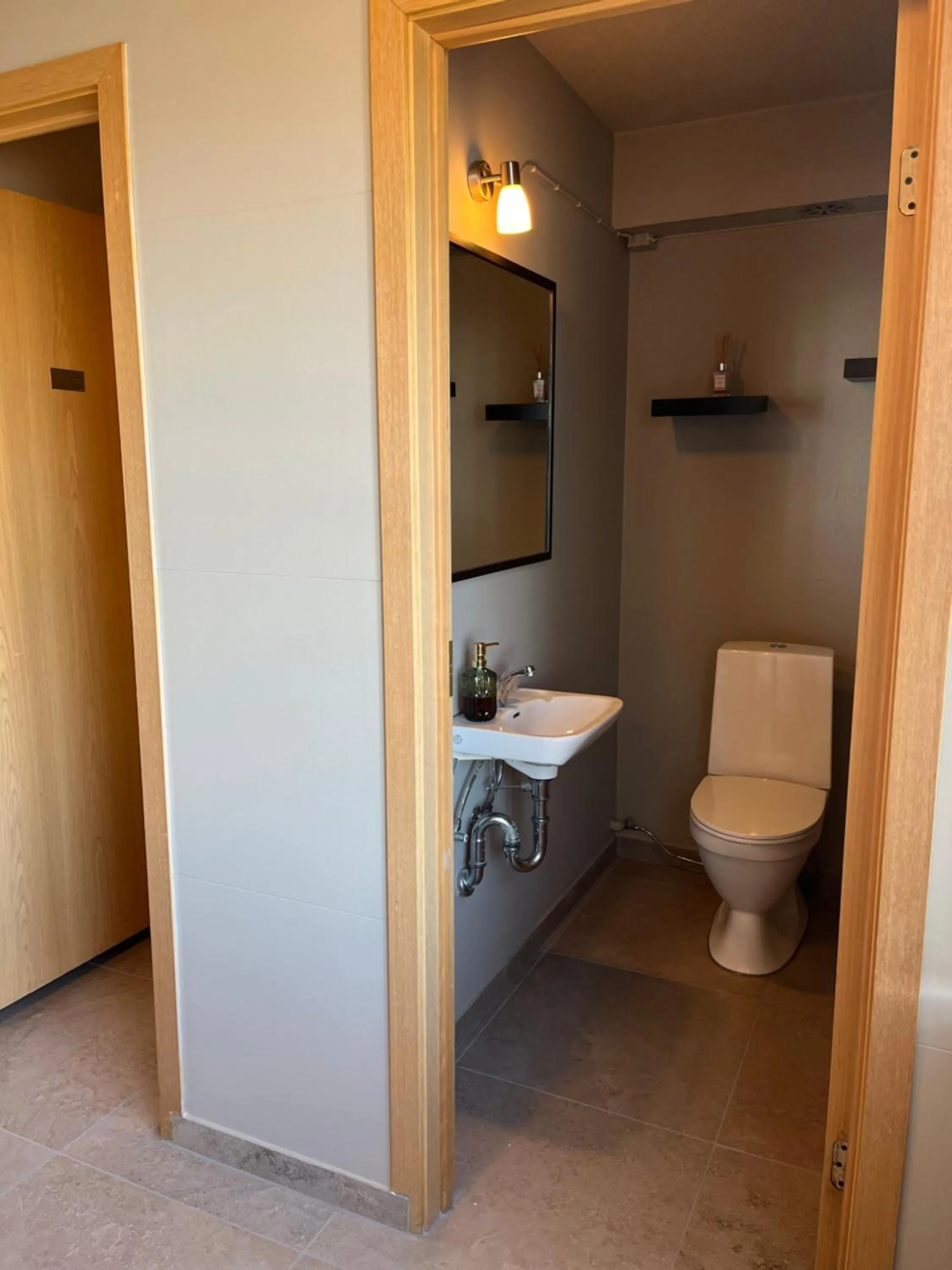 Toilet in Guesthouse Hvammur by the Harbour