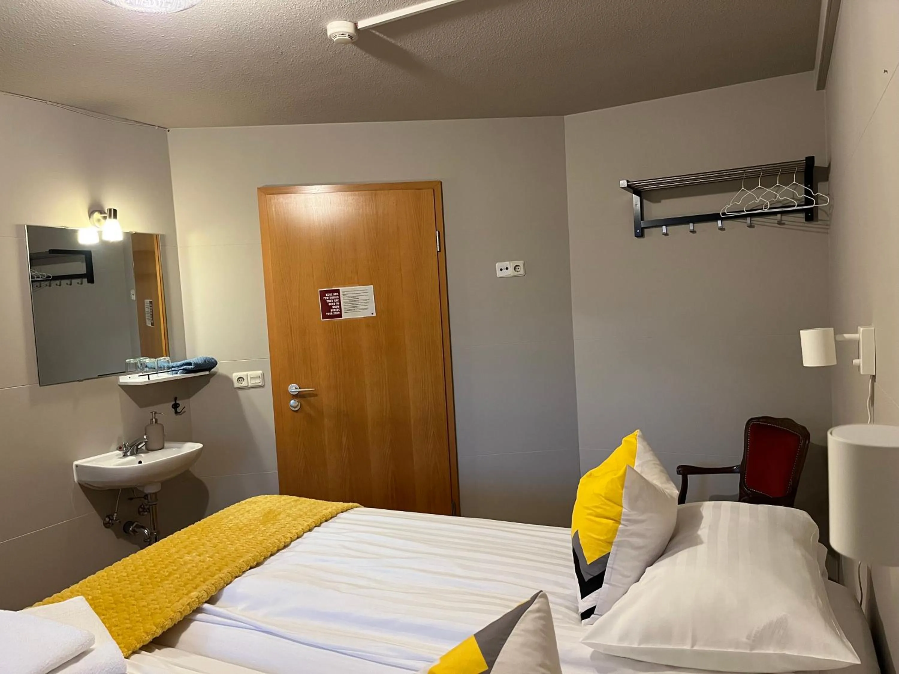 Bed in Guesthouse Hvammur by the Harbour