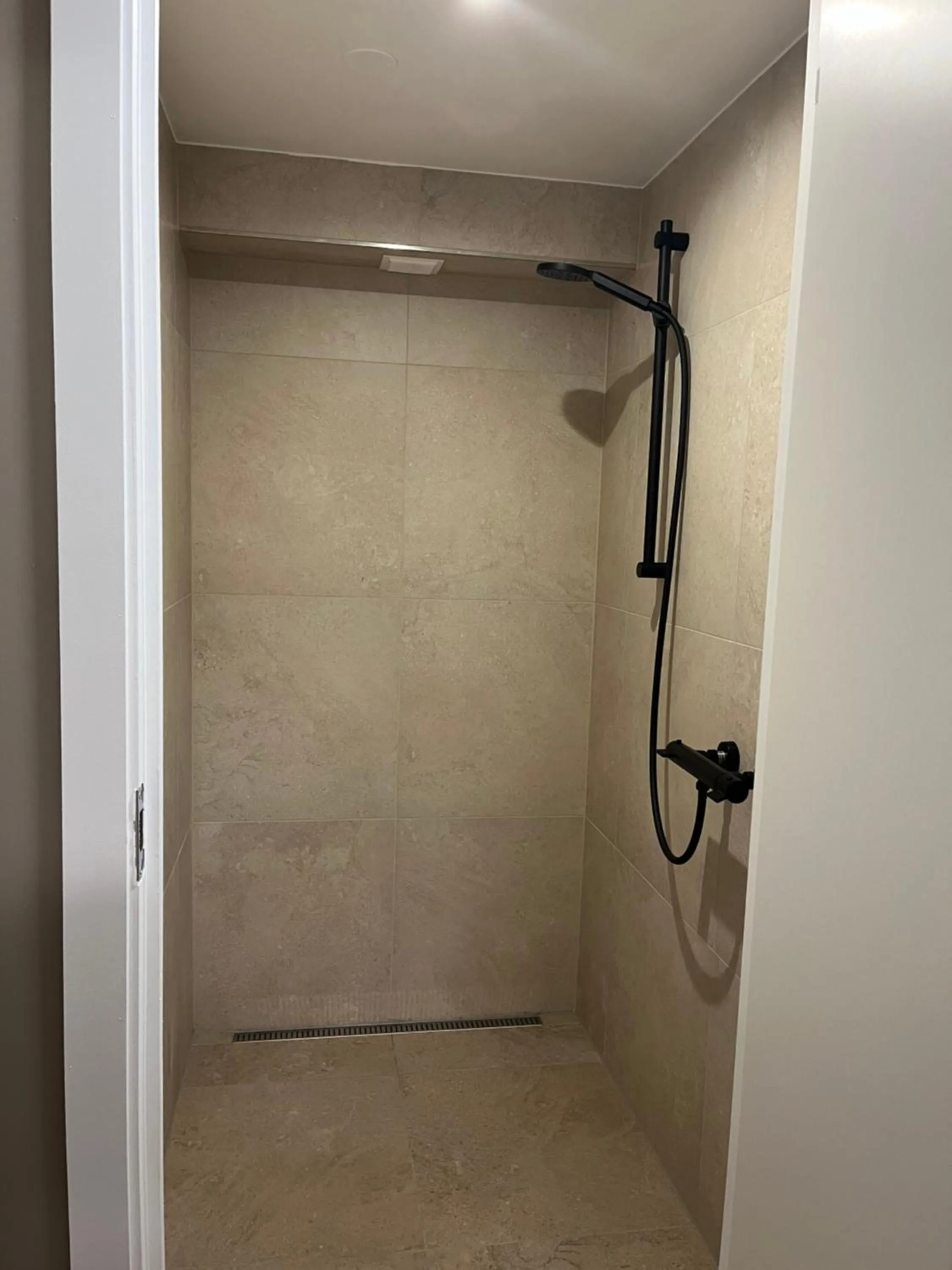 Shower in Guesthouse Hvammur by the Harbour