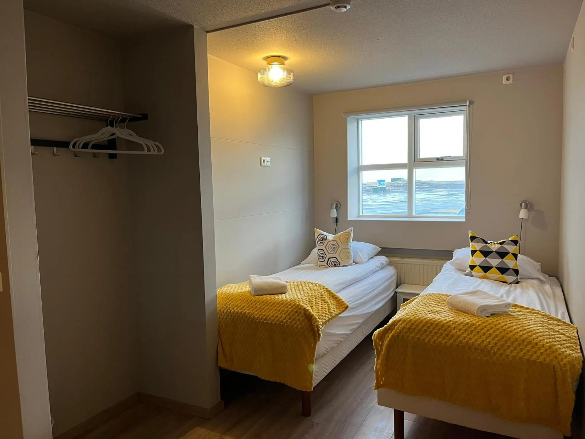 Bed in Guesthouse Hvammur by the Harbour