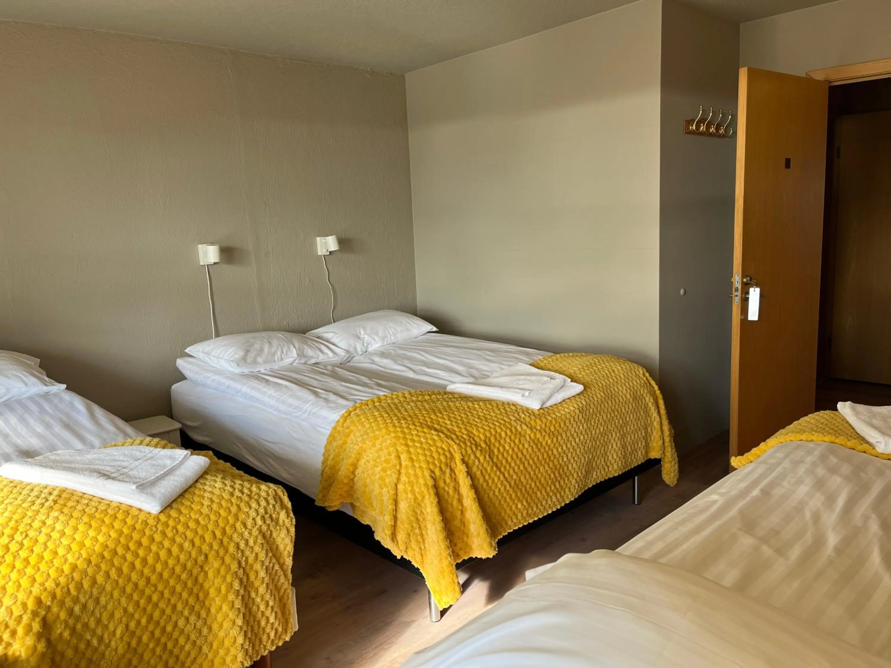 Bed in Guesthouse Hvammur by the Harbour