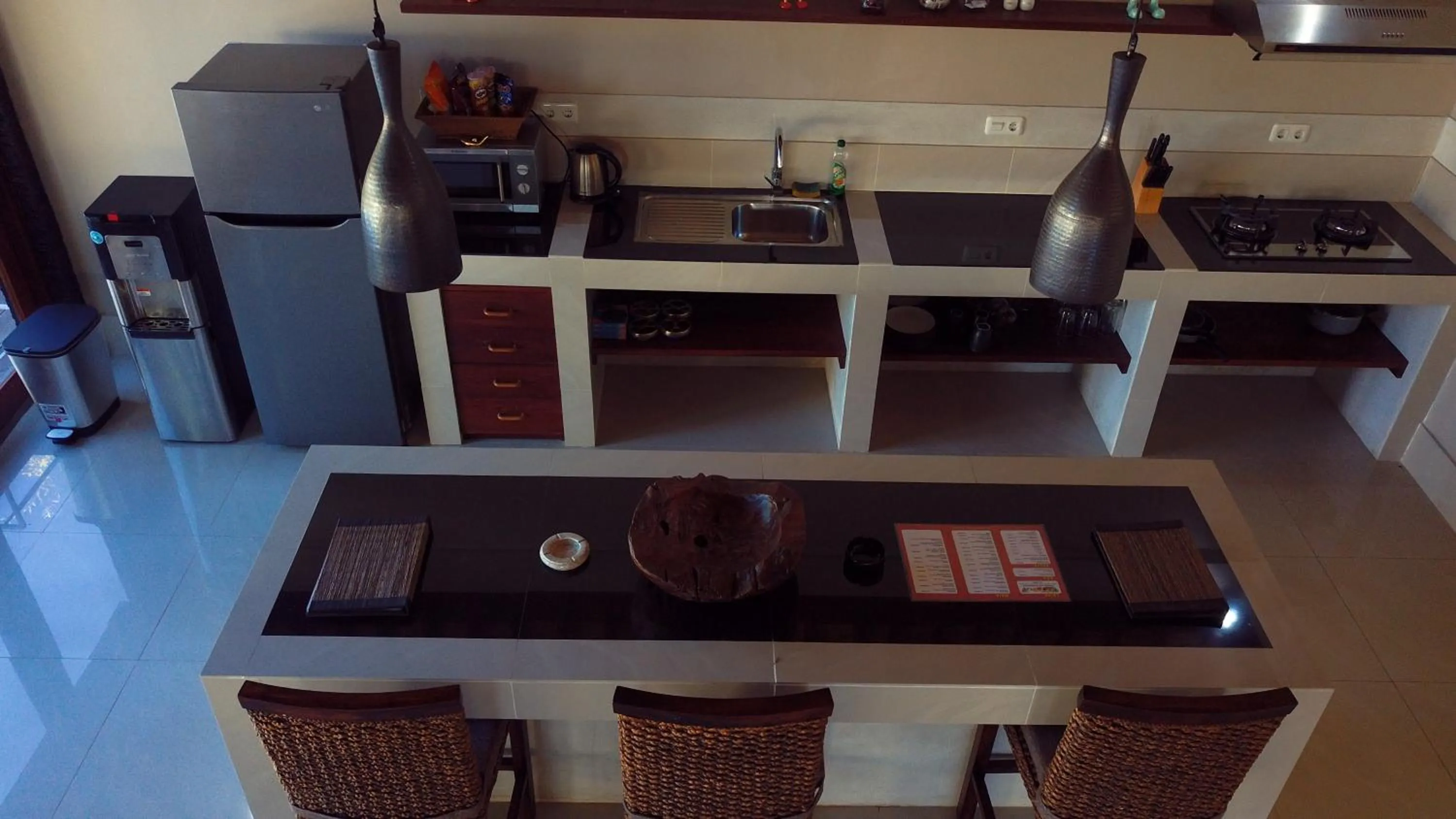 Kitchen or kitchenette in Gili Palms Villas