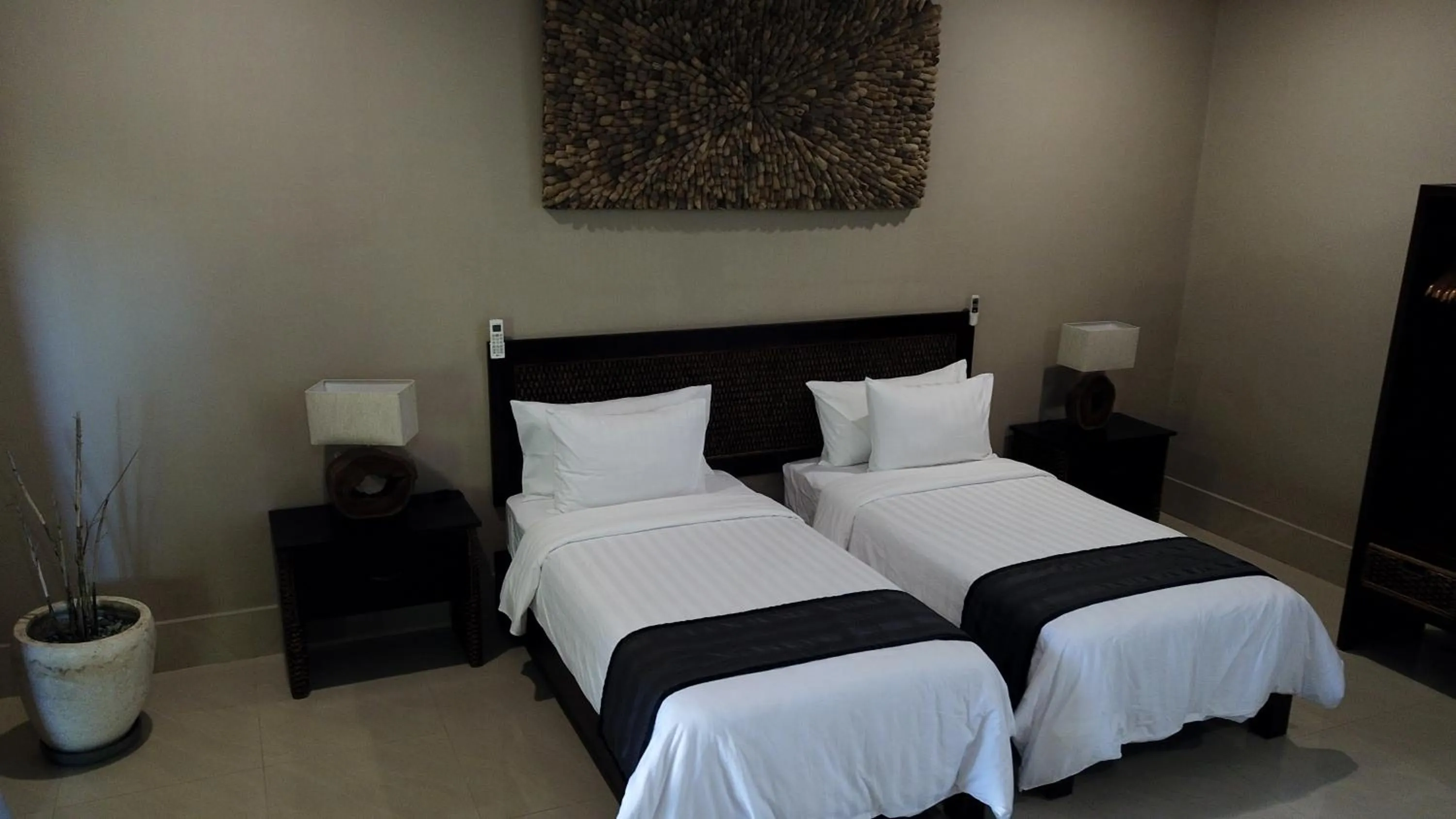 Bed in Gili Palms Villas