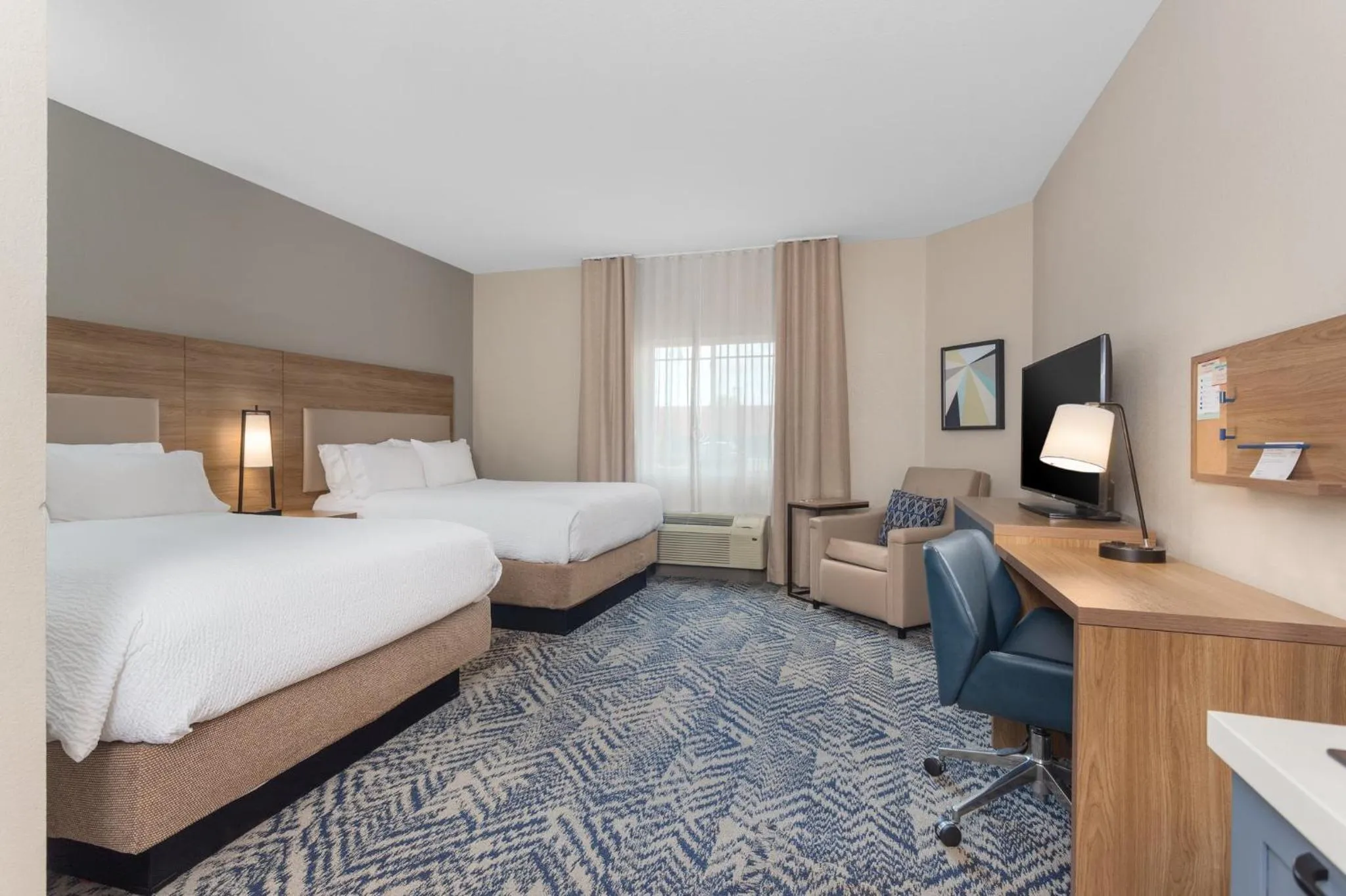 Photo of the whole room, Bed in Candlewood Suites La Crosse by IHG