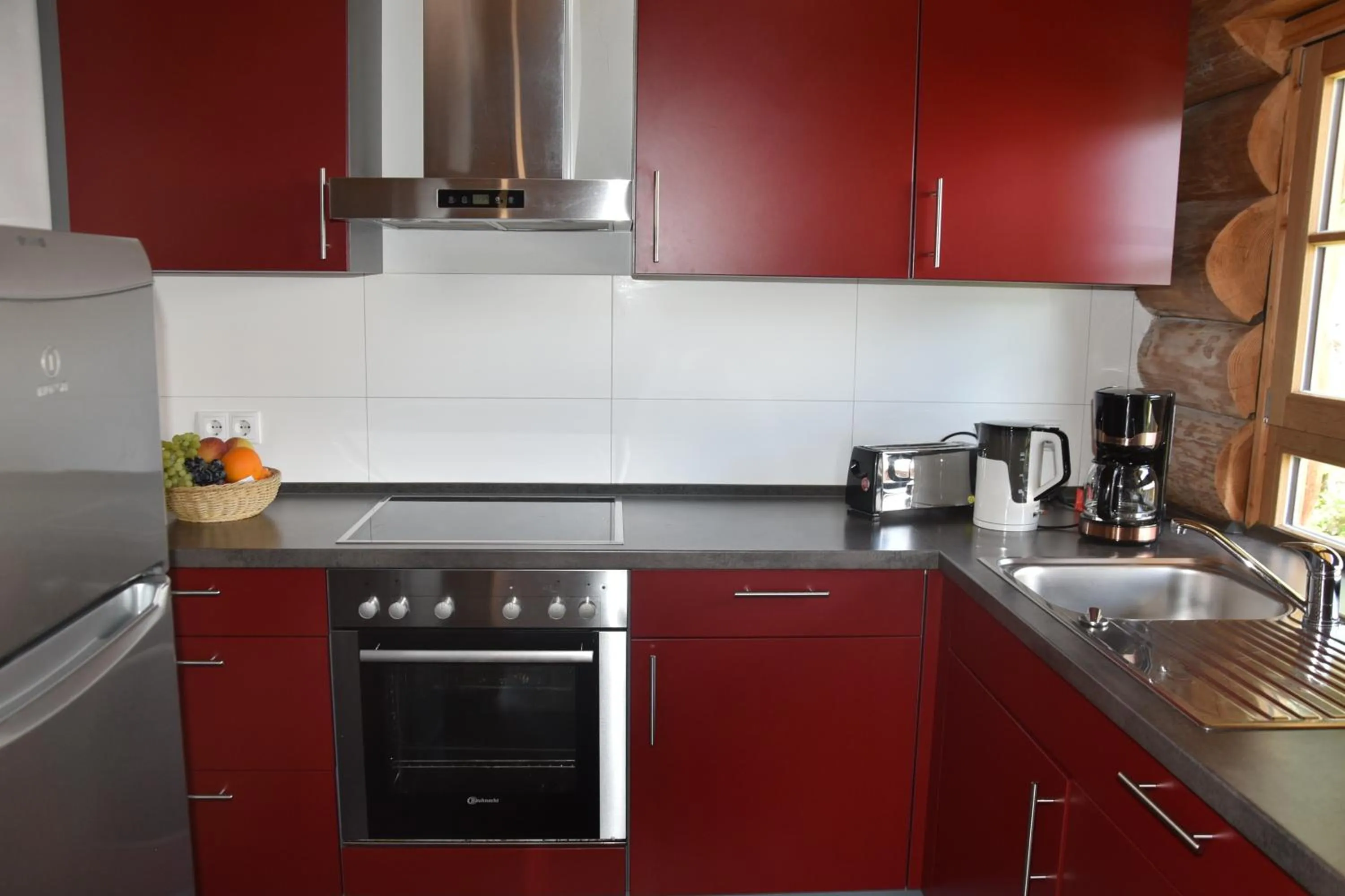 Kitchen or kitchenette in Hotel & Chalets Herrihof