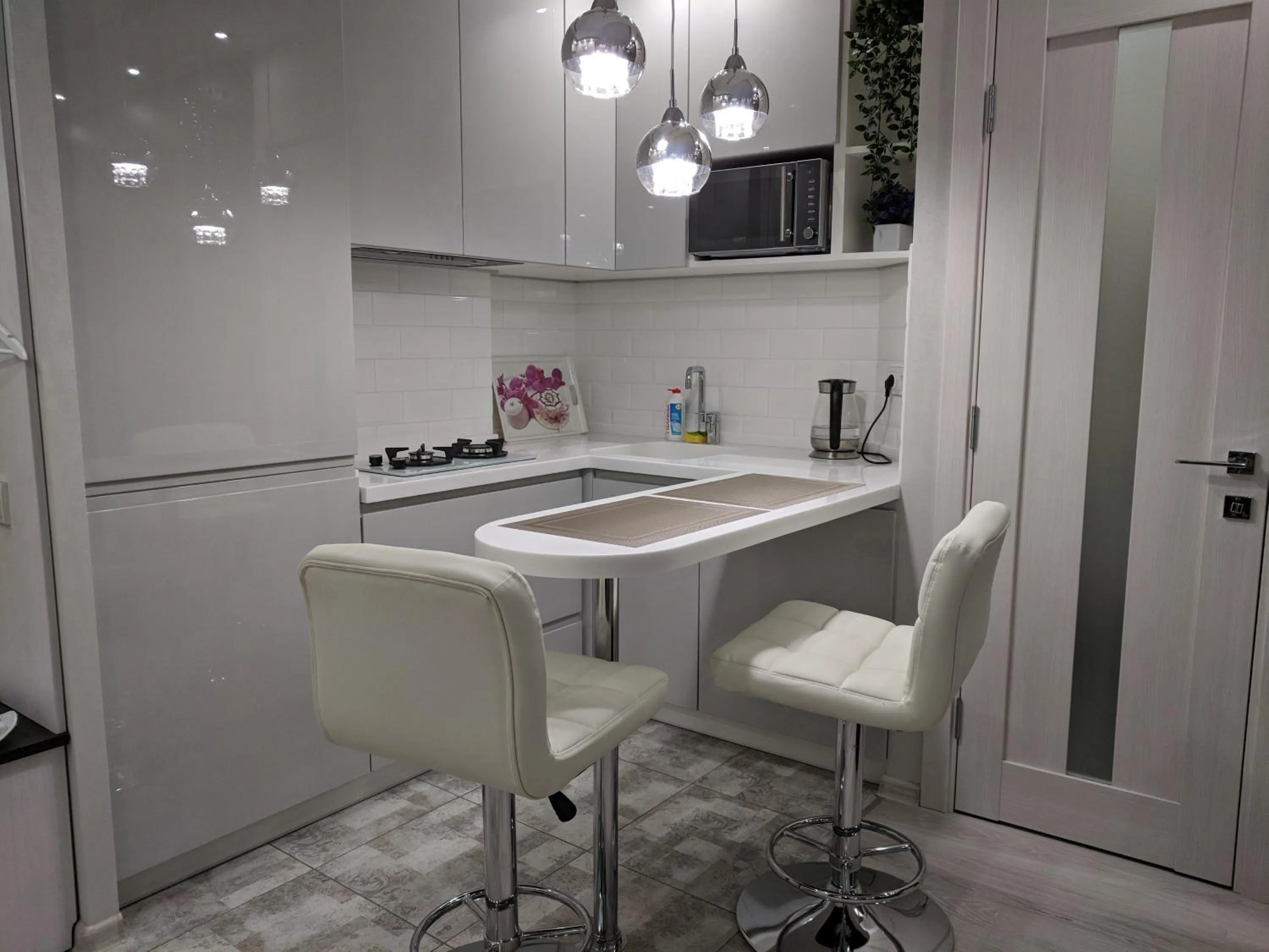 Kitchen or kitchenette in Apartment on Ekaterininskaya