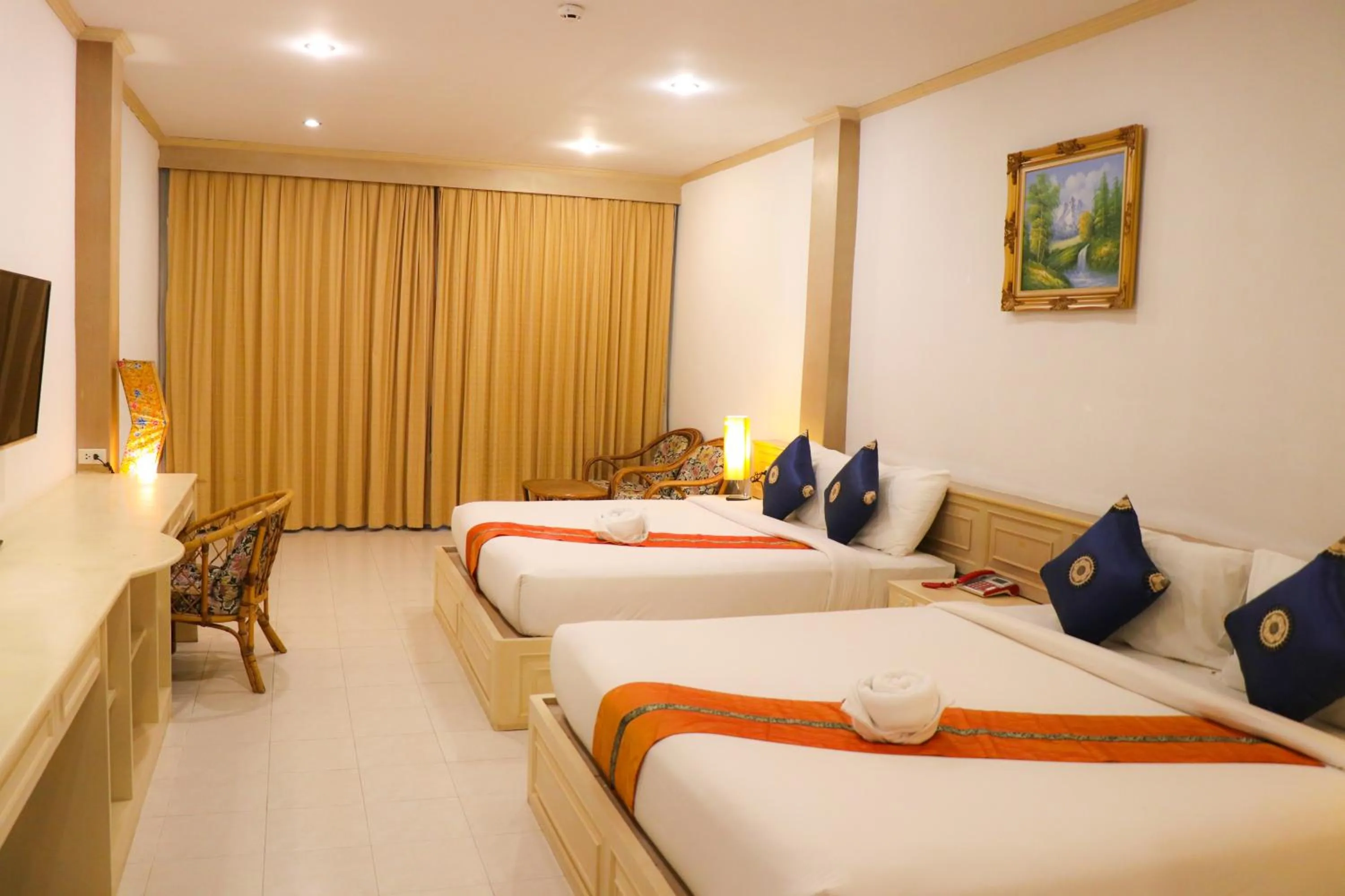 Photo of the whole room, Bed in Andaman Seaside Resort Bangtao Beach