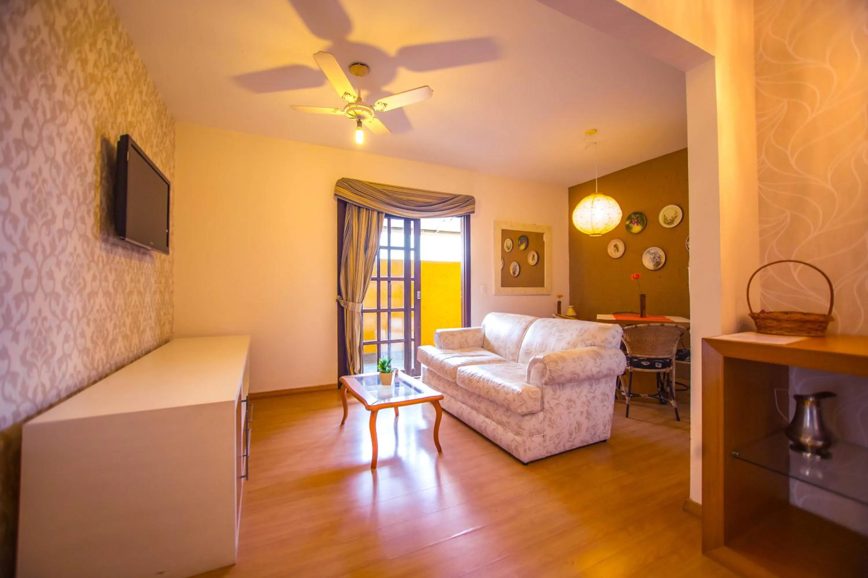 Living room, Bed in Pousada Dom Capudi