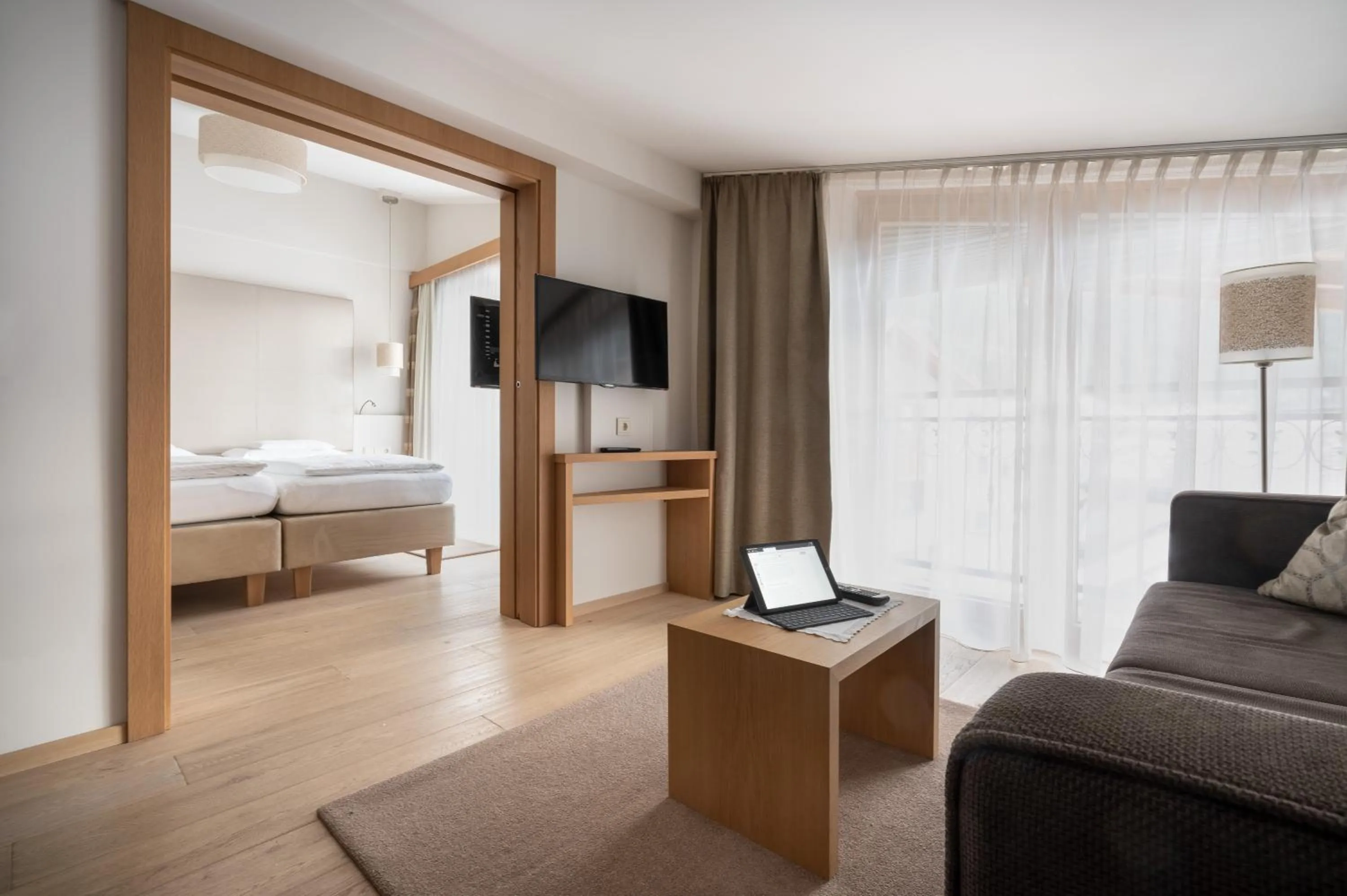 Living room, Bed in Hotel Trofana Alpin