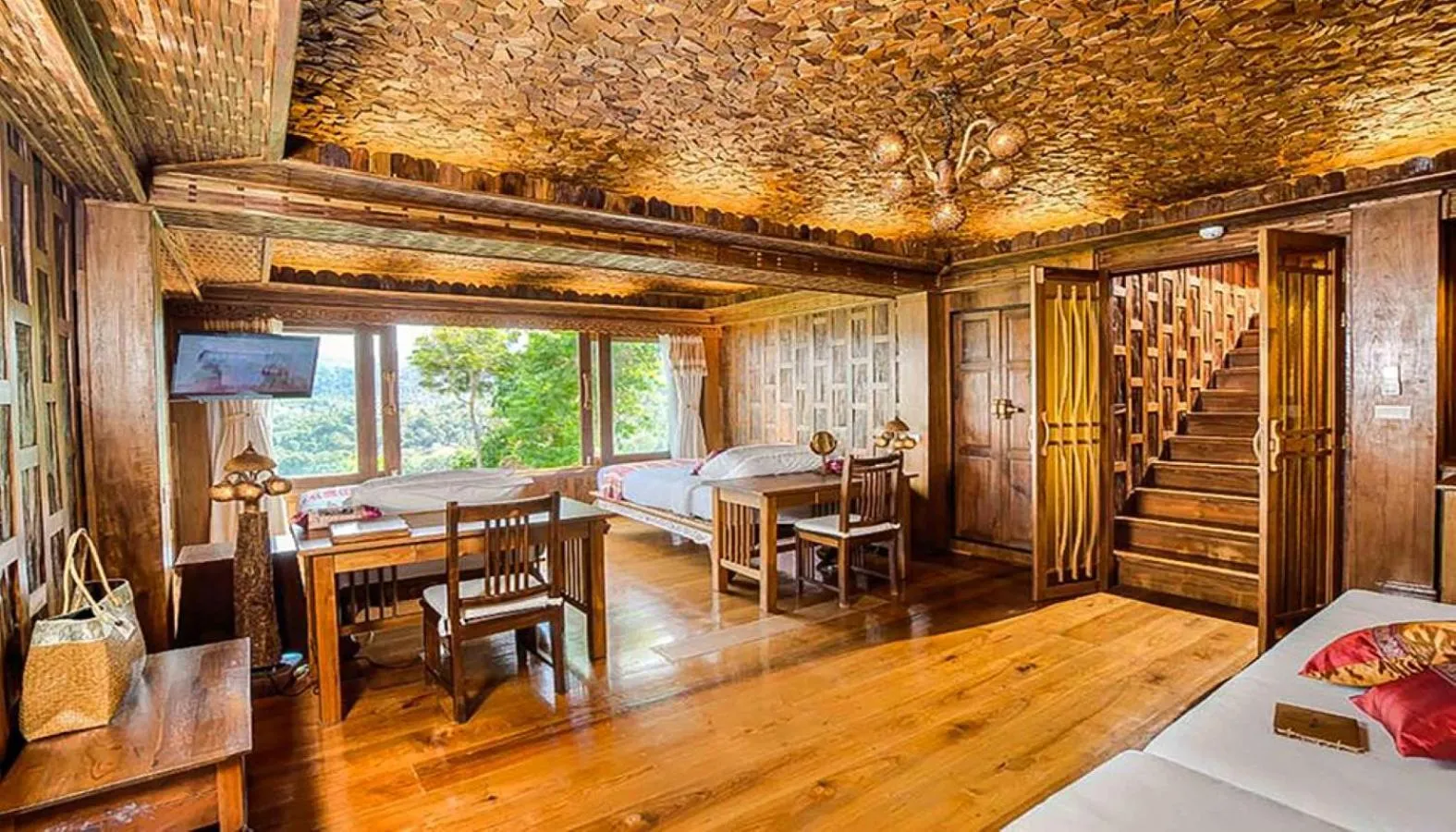 Bed in Santhiya Koh Phangan Resort and Spa