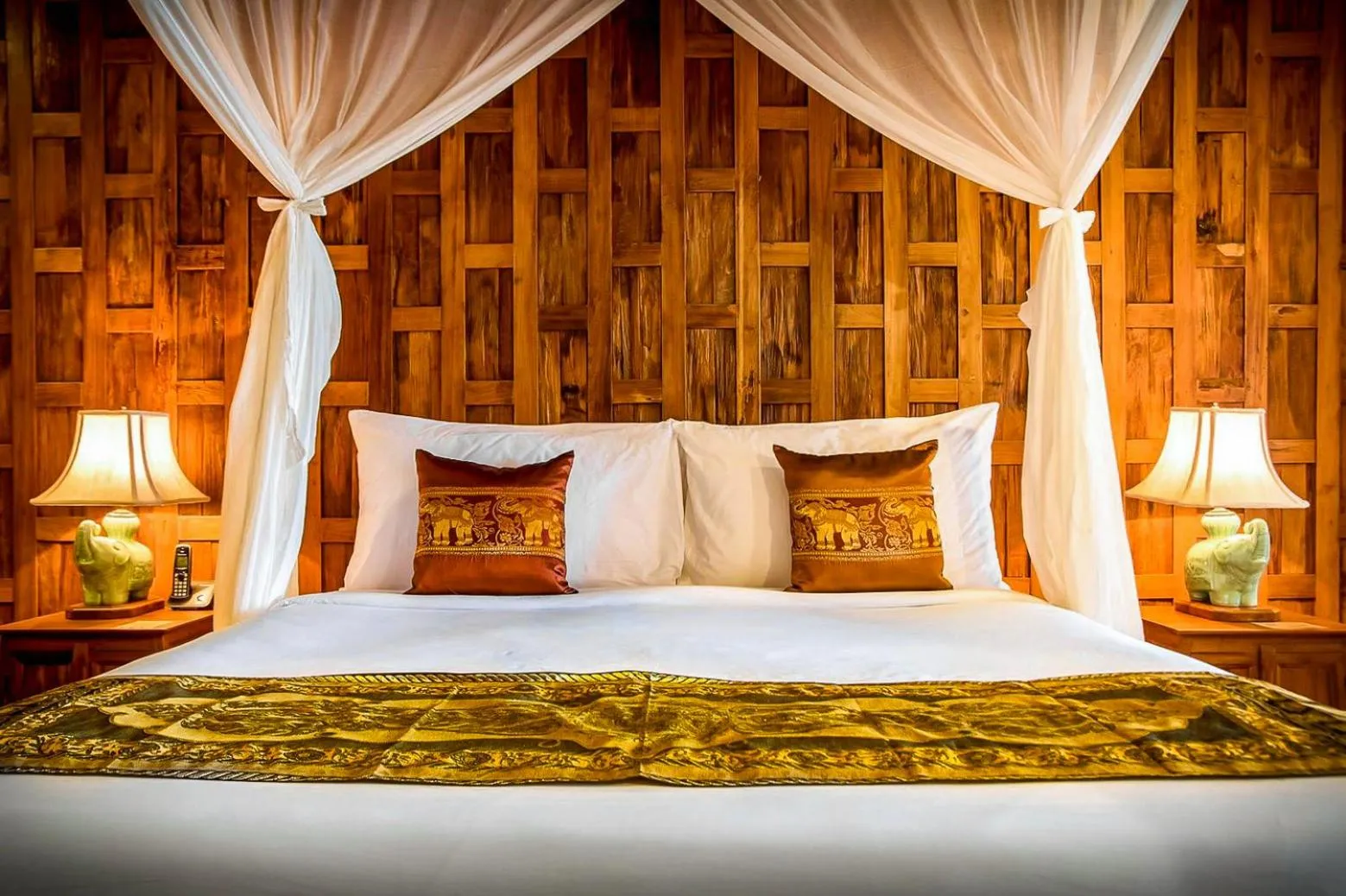 Bed in Santhiya Koh Phangan Resort and Spa