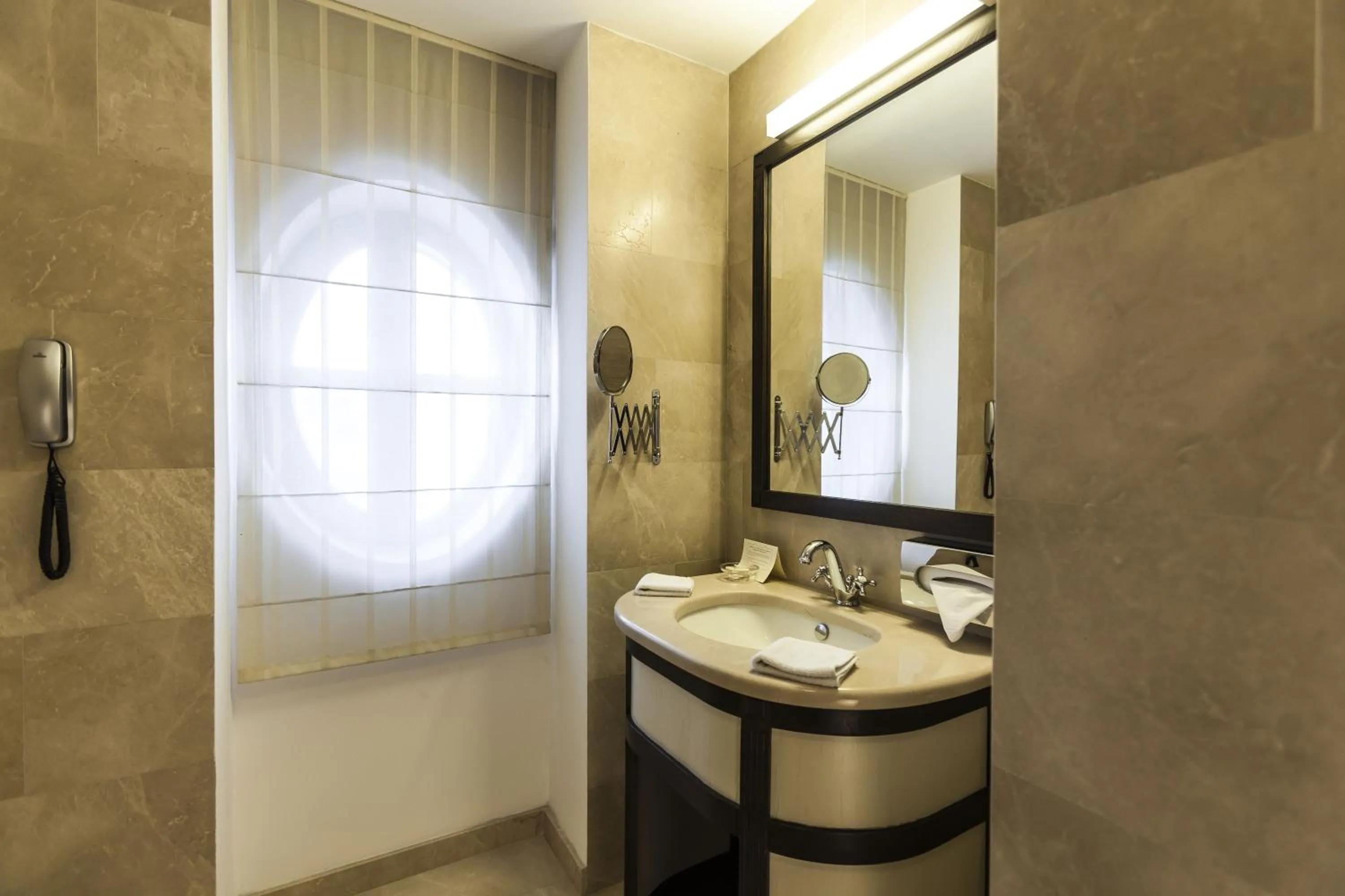 Bathroom in Epoque Hotel - Relais & Chateaux