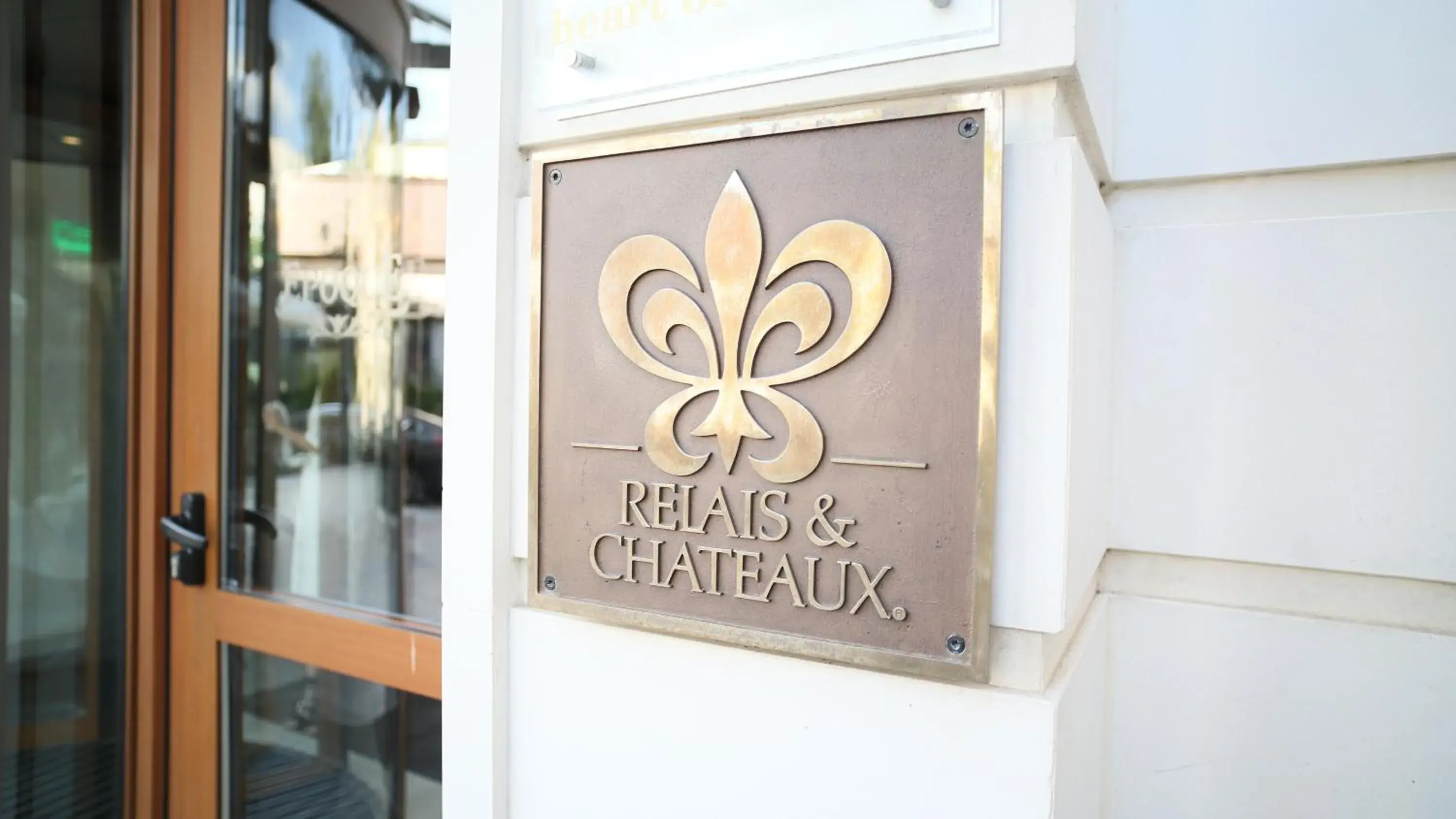 Property logo or sign in Epoque Hotel - Relais & Chateaux Property logo or sign in Epoque Hotel - Relais & Chateaux