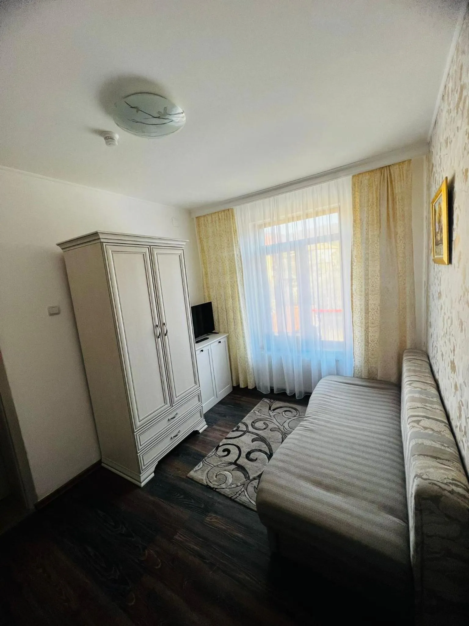 Living room, Bed in Hotel Suprem