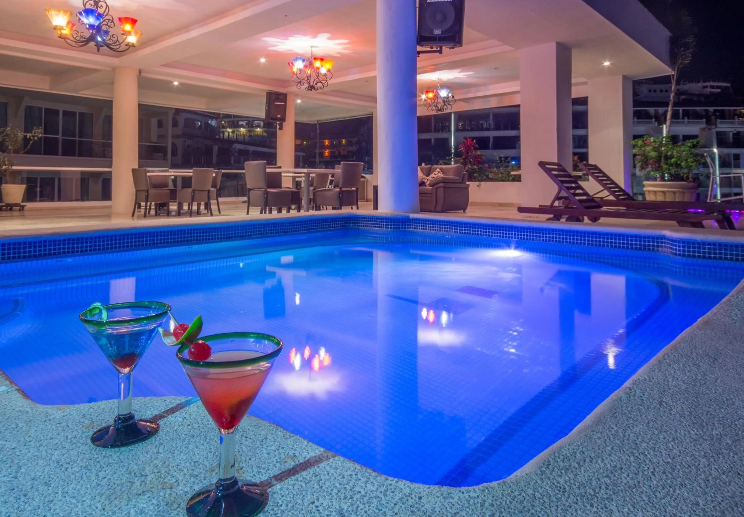 Swimming pool in Blue Chairs Beachfront Resort Puerto Vallarta - Adults Only