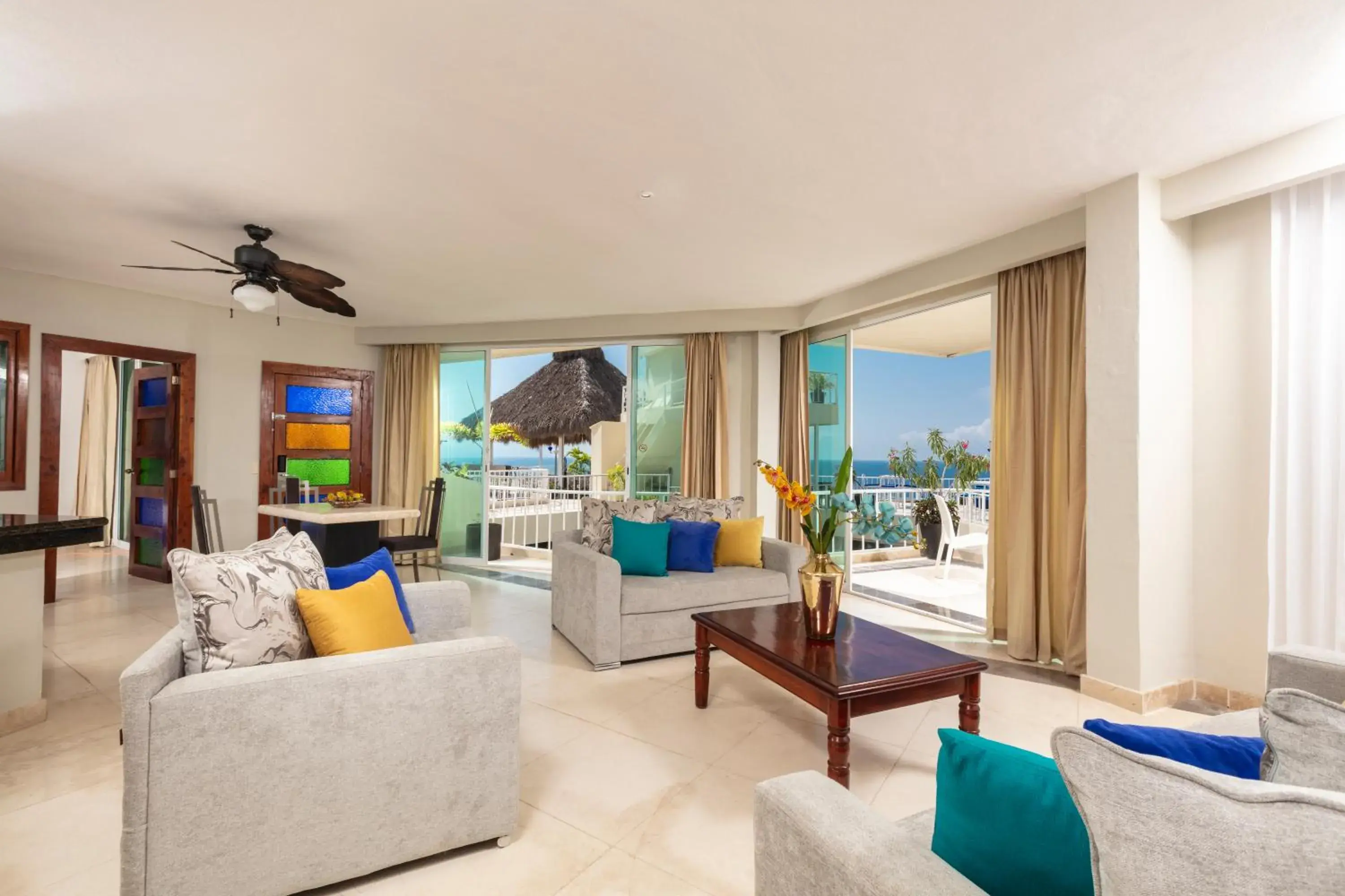 Living room in Blue Chairs Beachfront Resort Puerto Vallarta - Adults Only Living room in Blue Chairs Beachfront Resort Puerto Vallarta - Adults Only