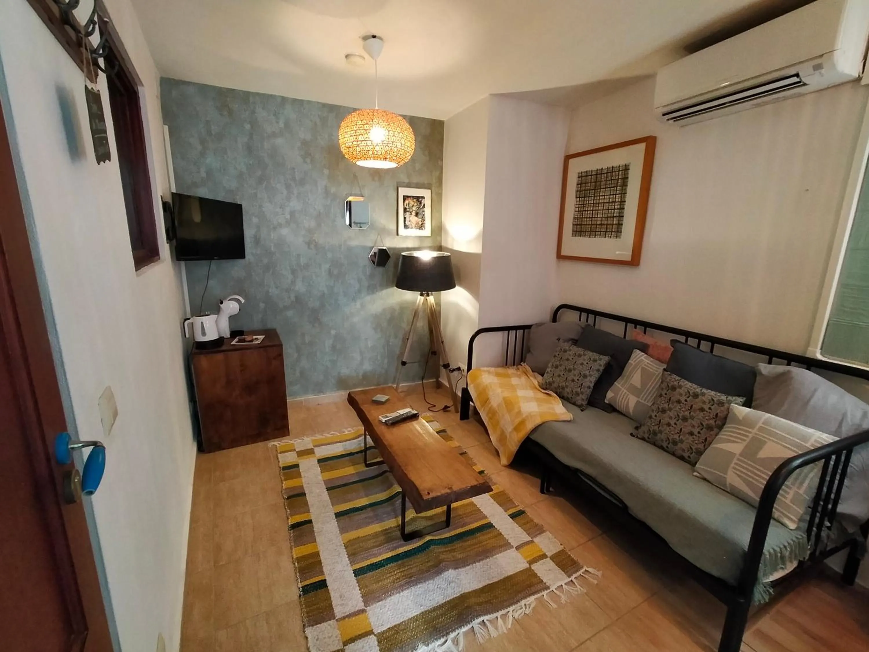 Living room in Dios Esta Bien
