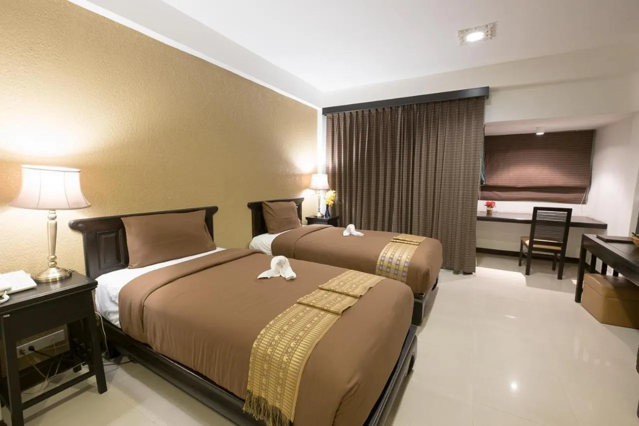 Bed in Siam Piman Hotel