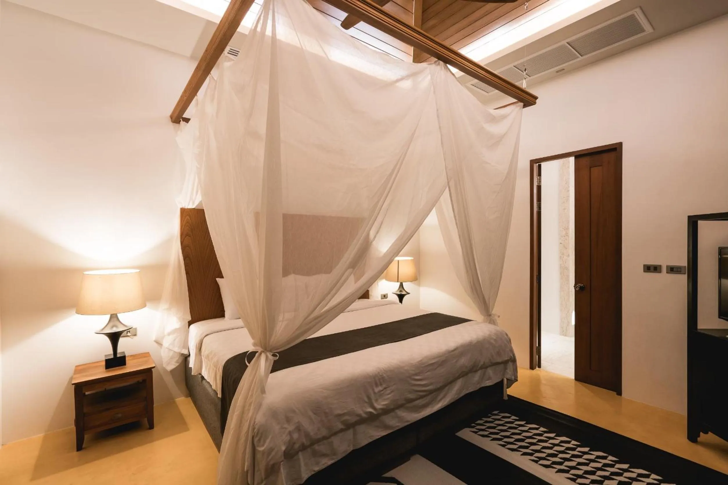 Bed in Malisa Villa Suites - SHA Extra Plus