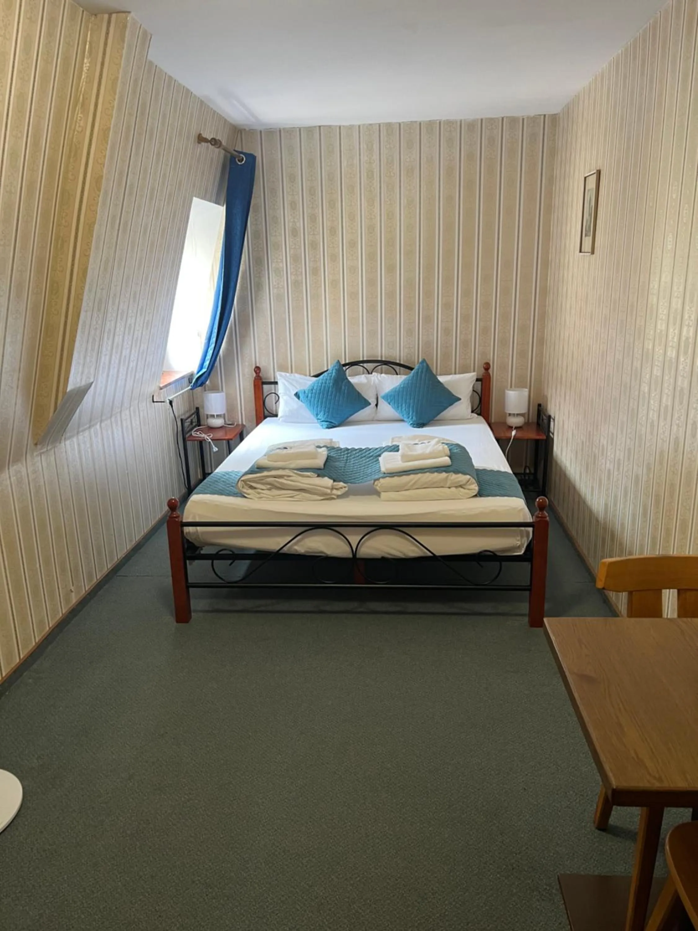 Bed in Hotel Schwarzer Adler