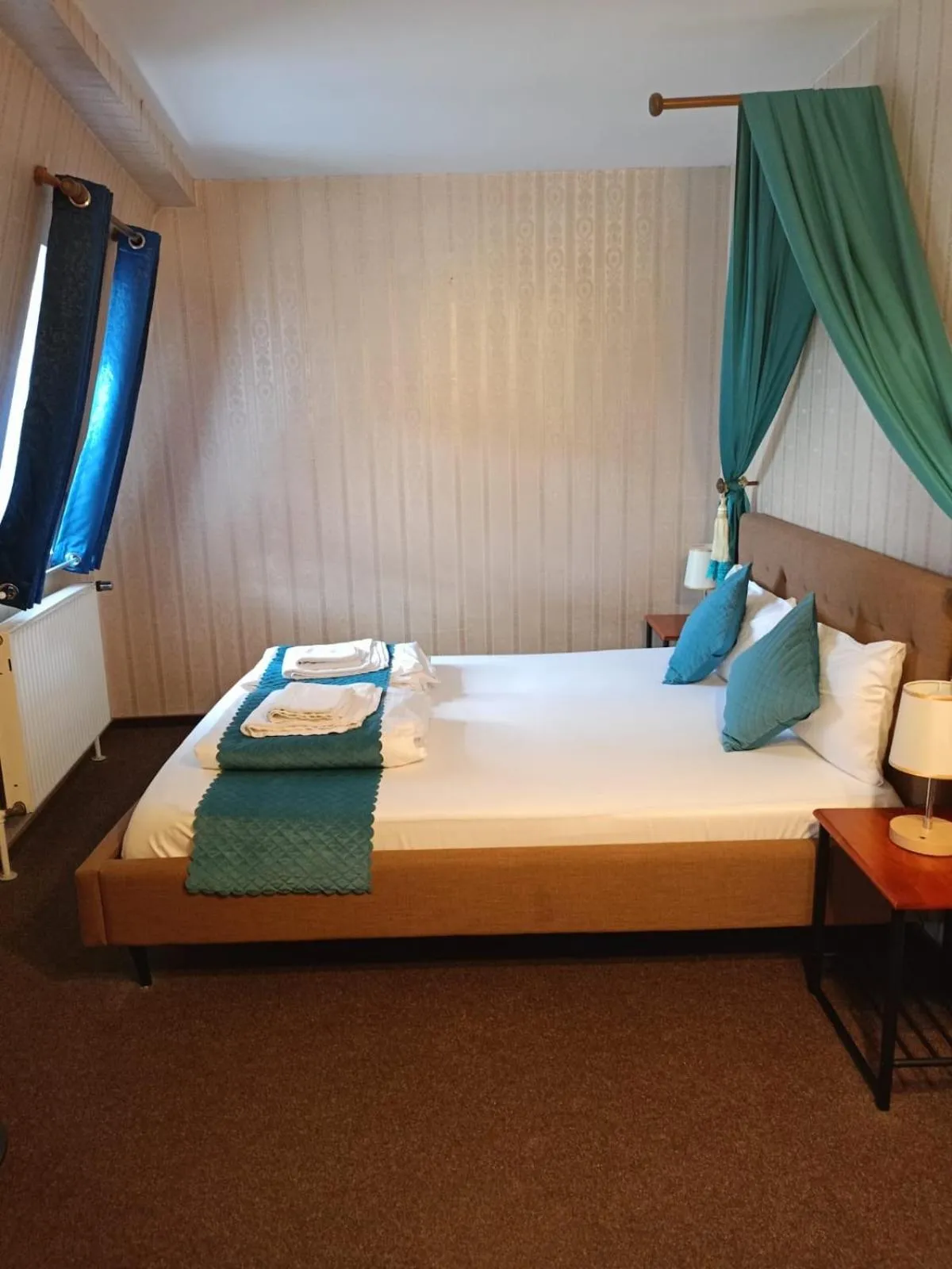 Bed in Hotel Schwarzer Adler