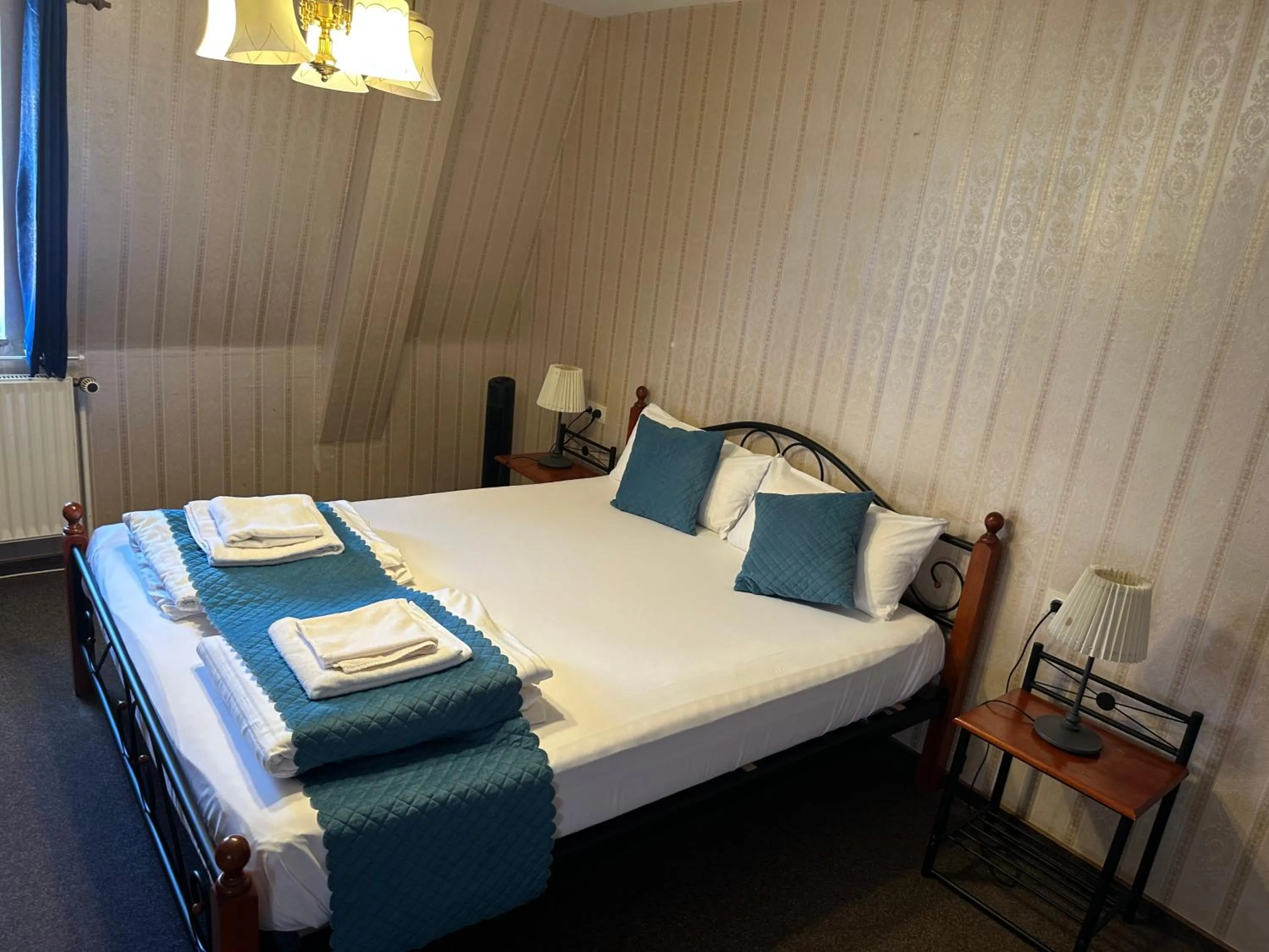 Photo of the whole room, Bed in Hotel Schwarzer Adler