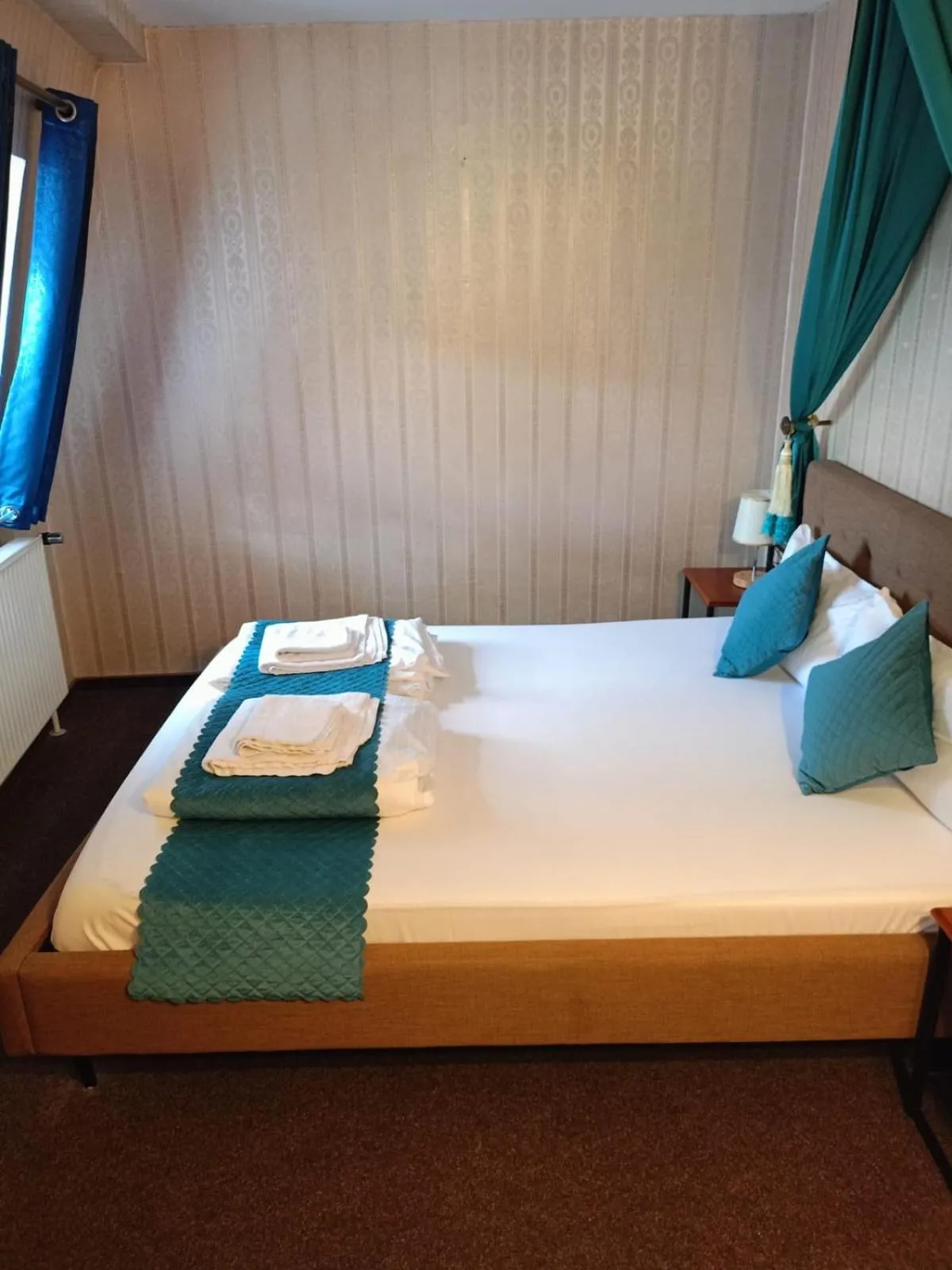 Bed in Hotel Schwarzer Adler