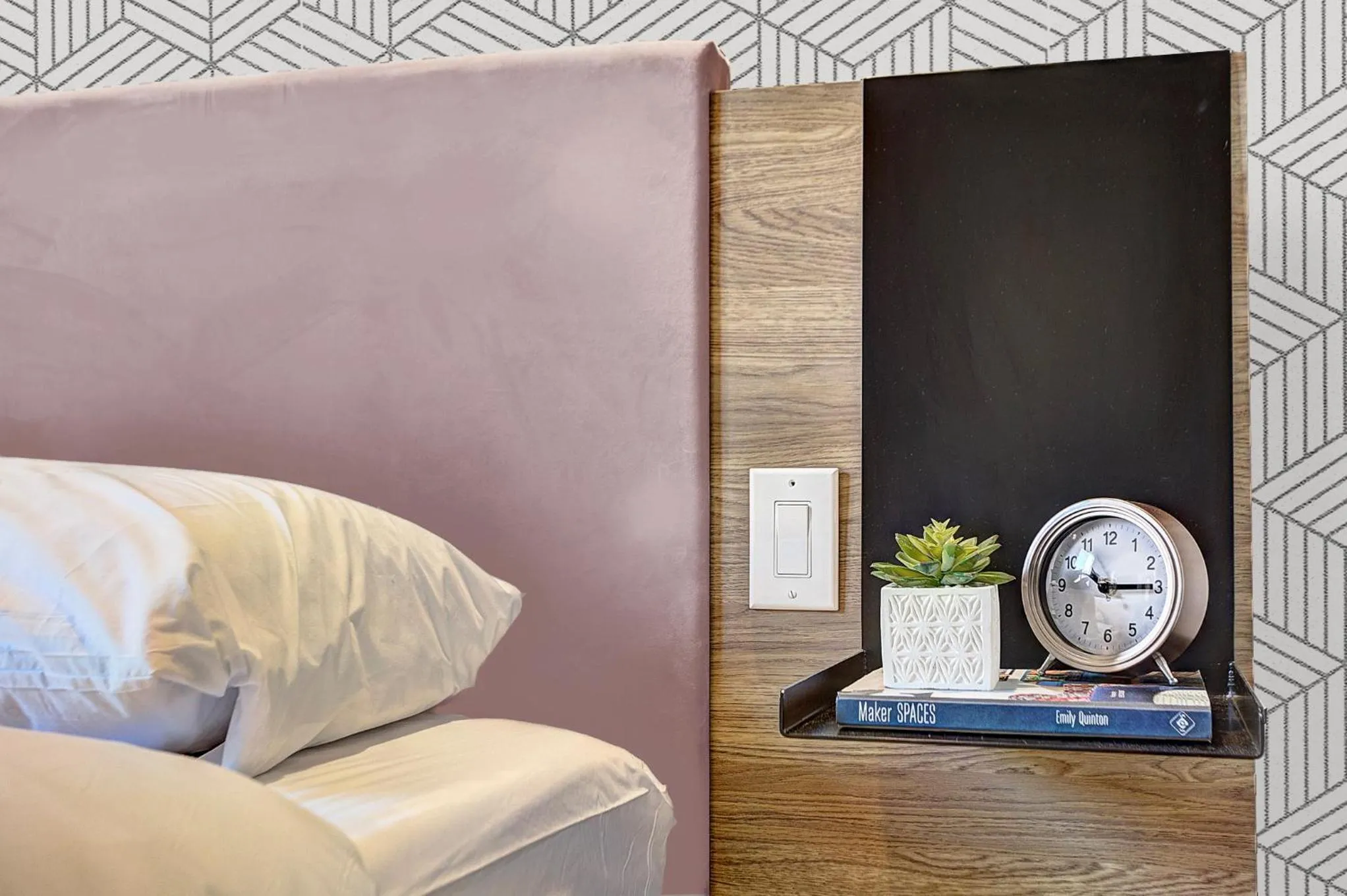 Bed in Pierce Boutique Apartments by Simplissimmo