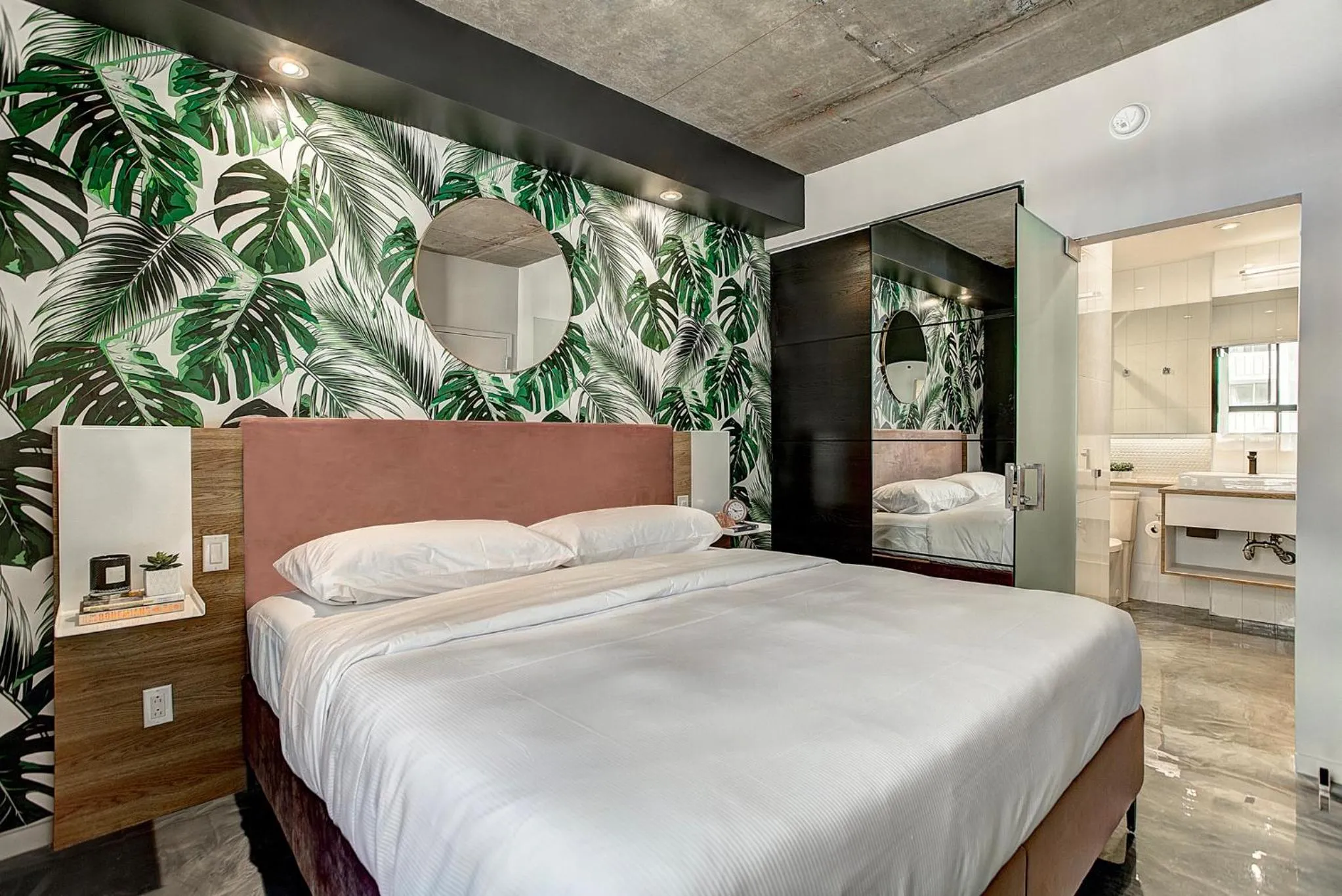 Bed in Pierce Boutique Apartments by Simplissimmo