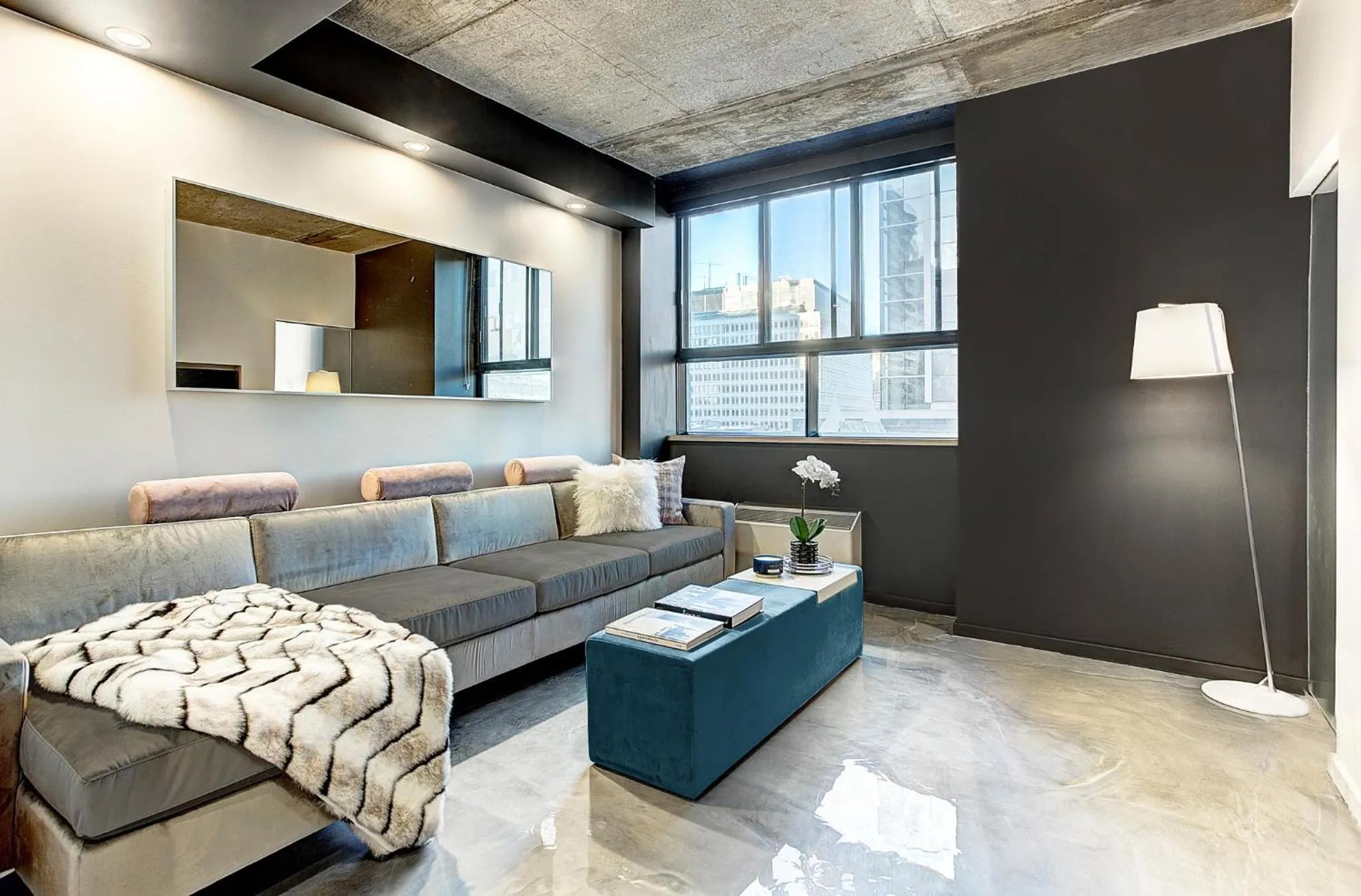 Living room, Bed in Pierce Boutique Apartments by Simplissimmo