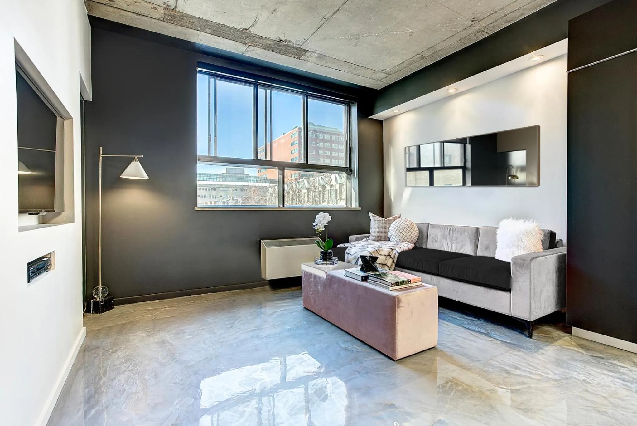 Living room, Bed in Pierce Boutique Apartments by Simplissimmo