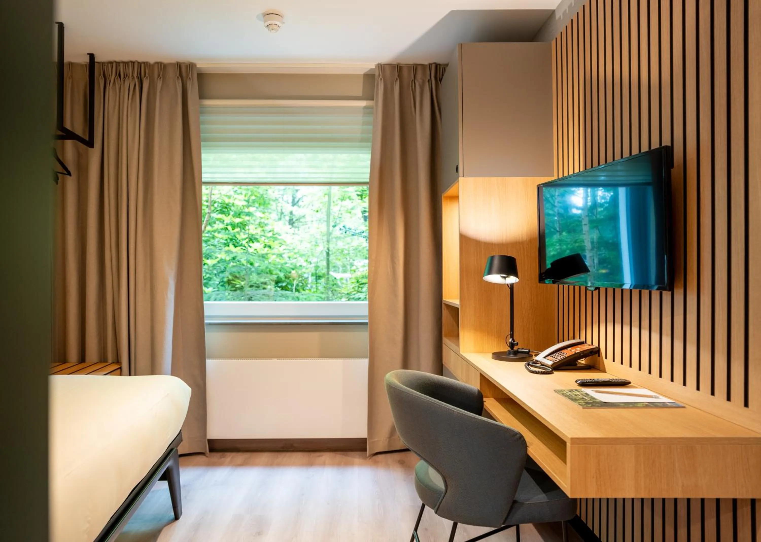 Bed in Hotel Kontakt der Kontinenten