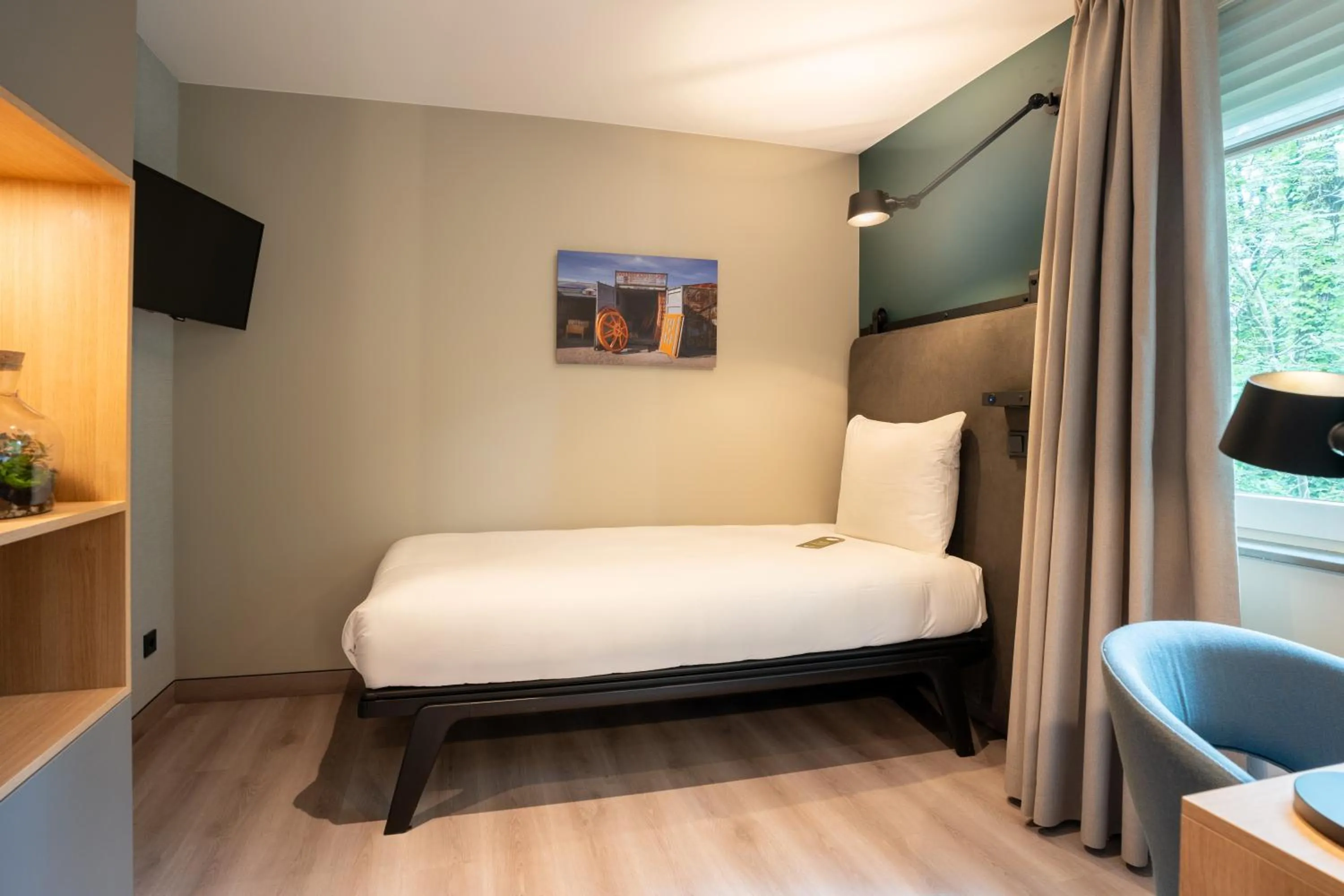 Bed in Hotel Kontakt der Kontinenten