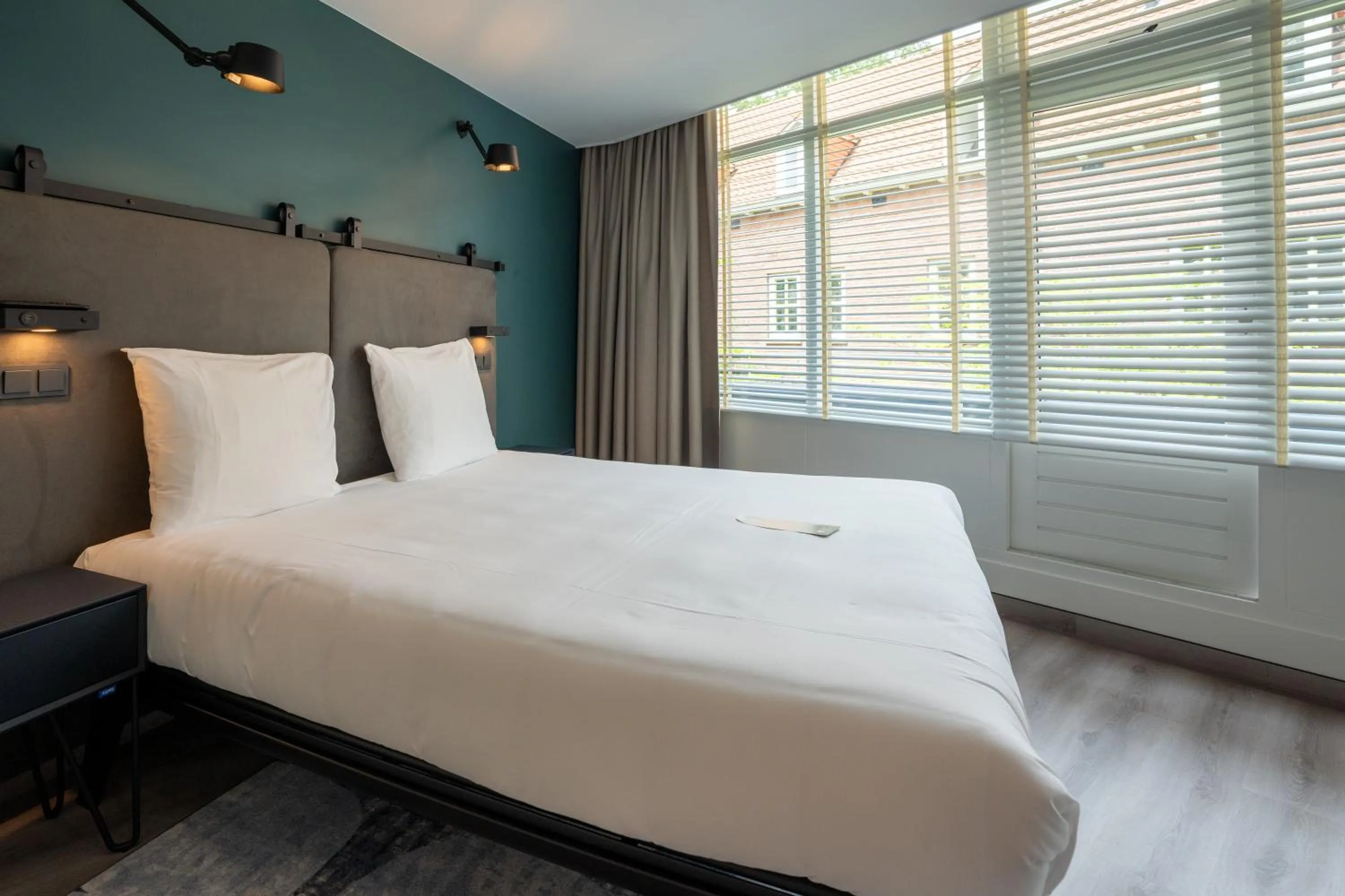 Bed in Hotel Kontakt der Kontinenten