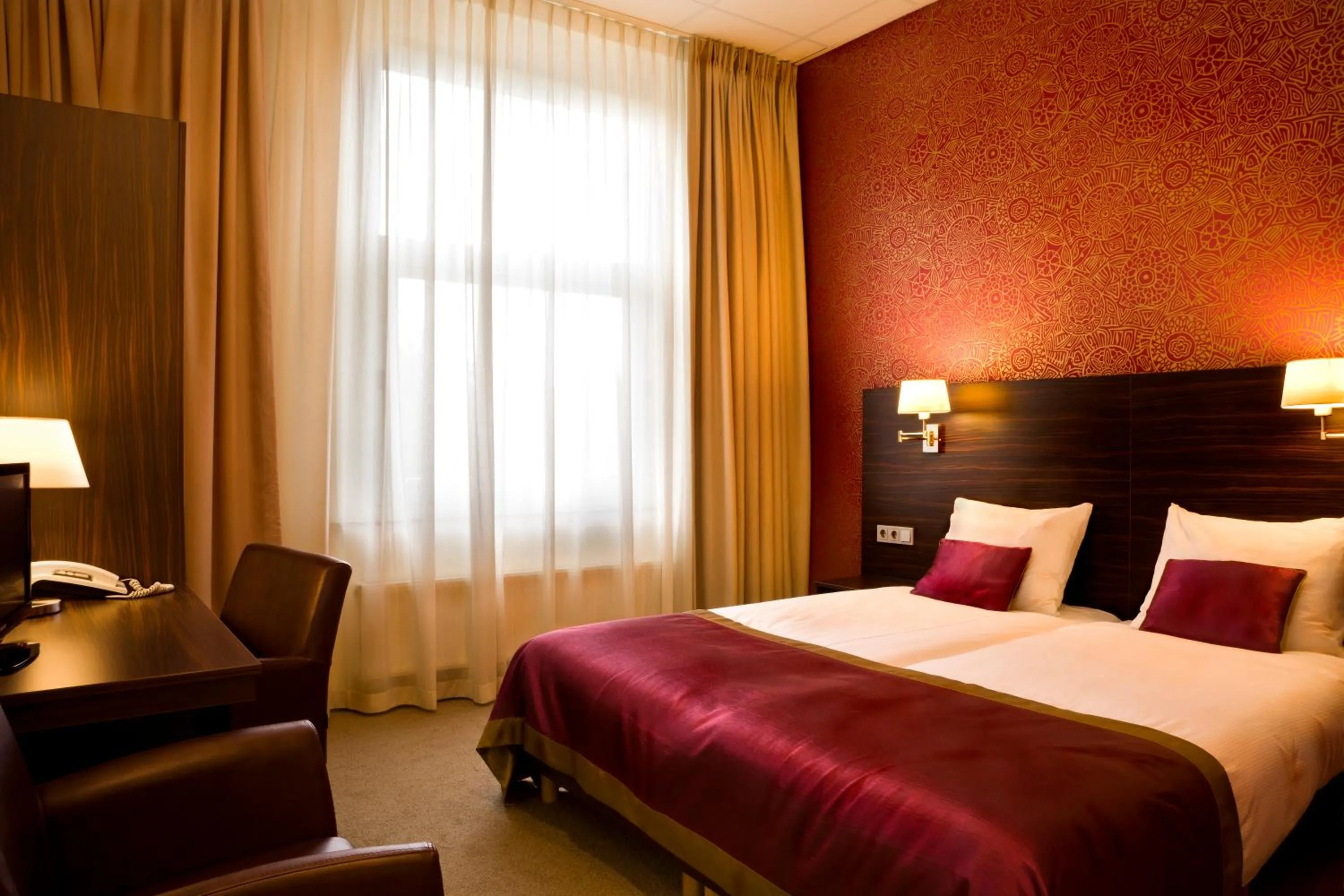 Bed in Hotel Kontakt der Kontinenten