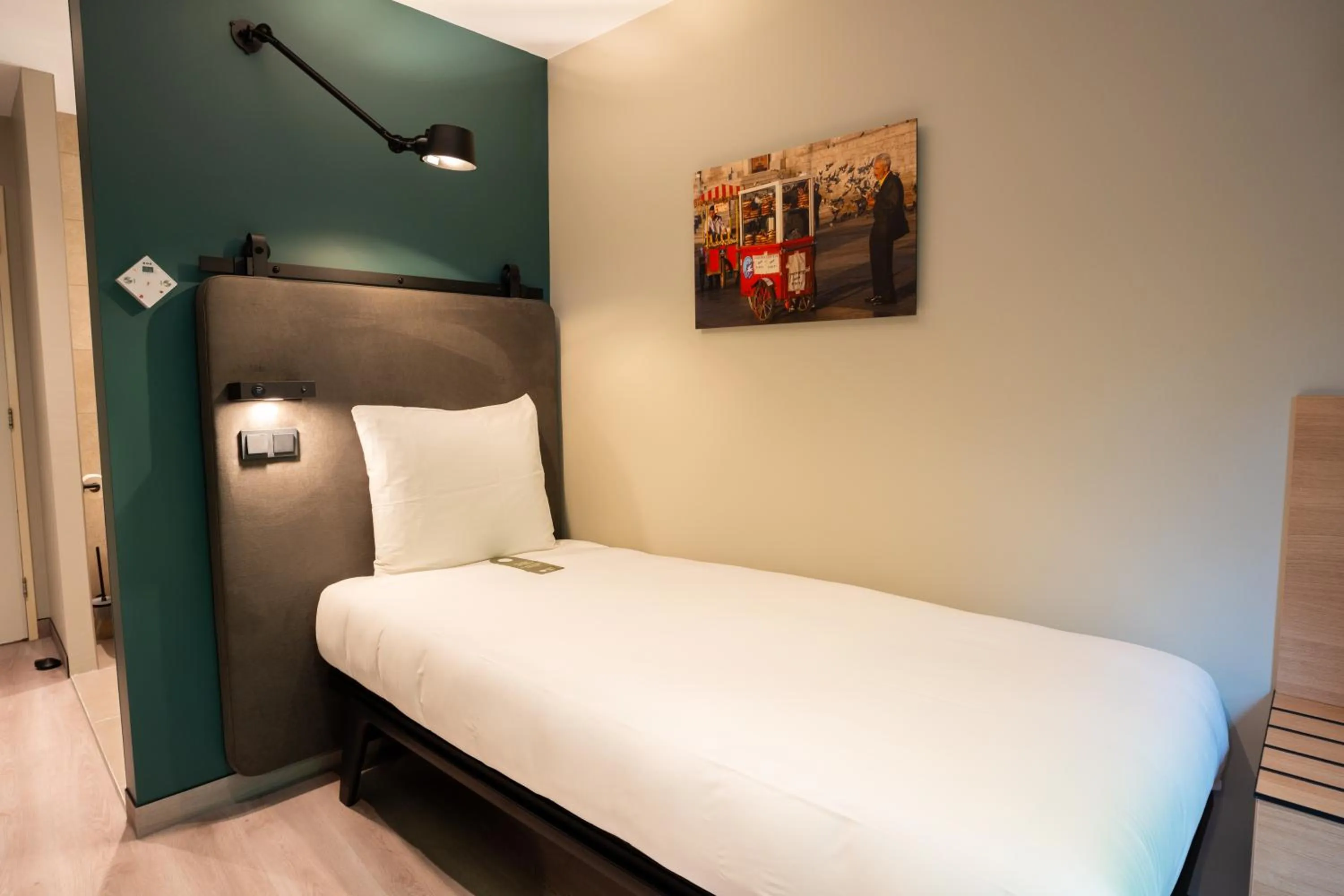 Bed in Hotel Kontakt der Kontinenten