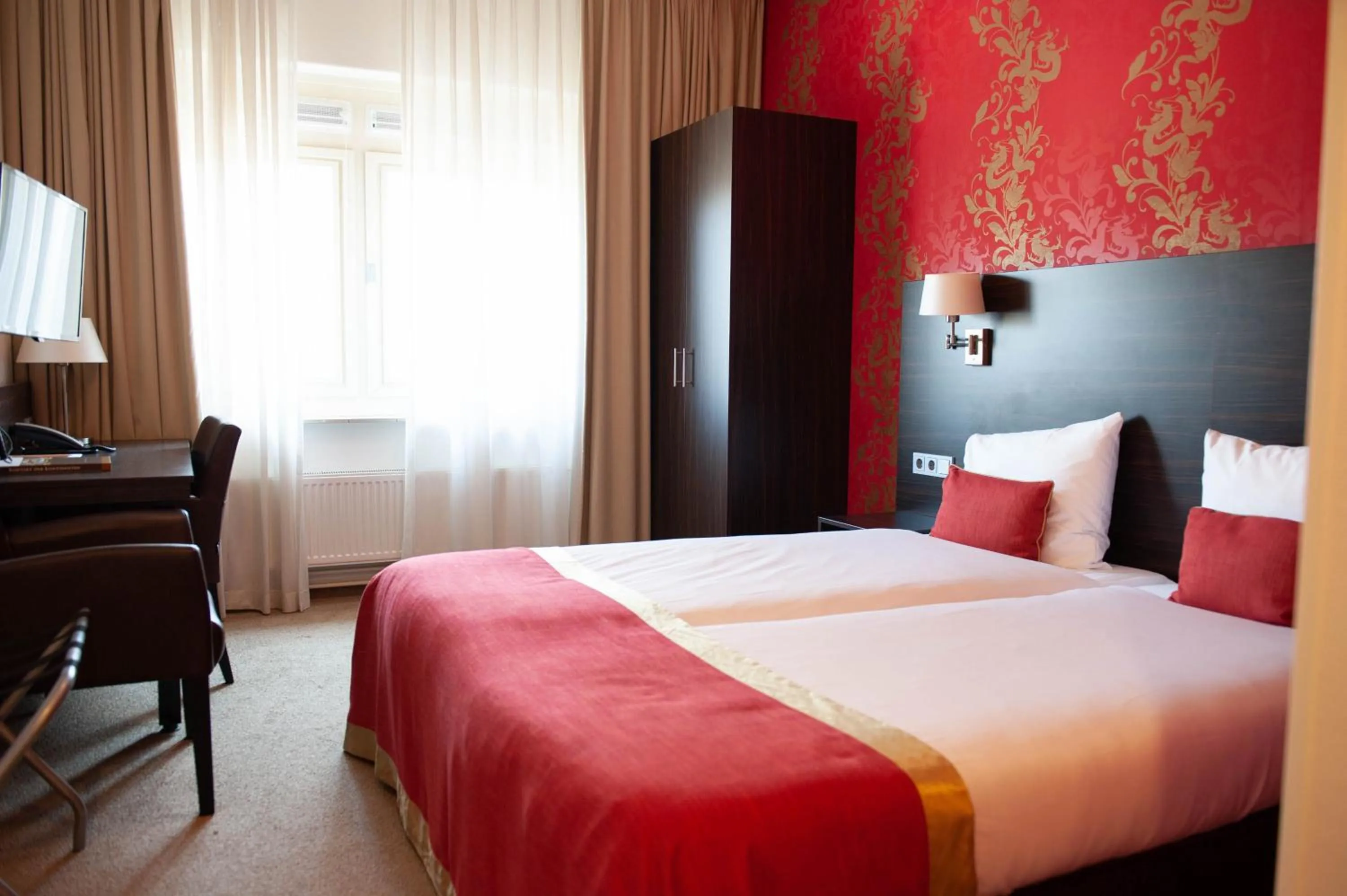 Bed in Hotel Kontakt der Kontinenten