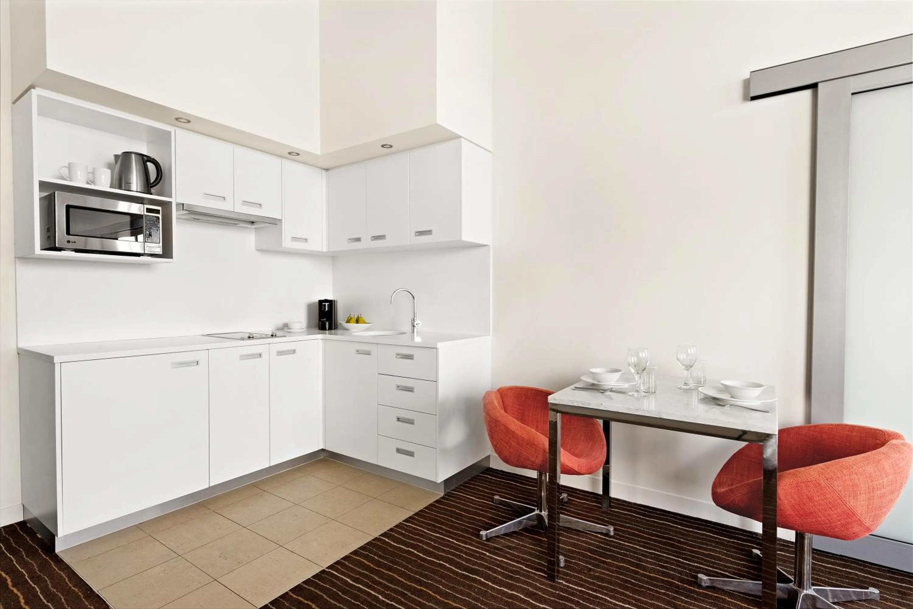 Kitchen or kitchenette in Mantra Charles Hotel
