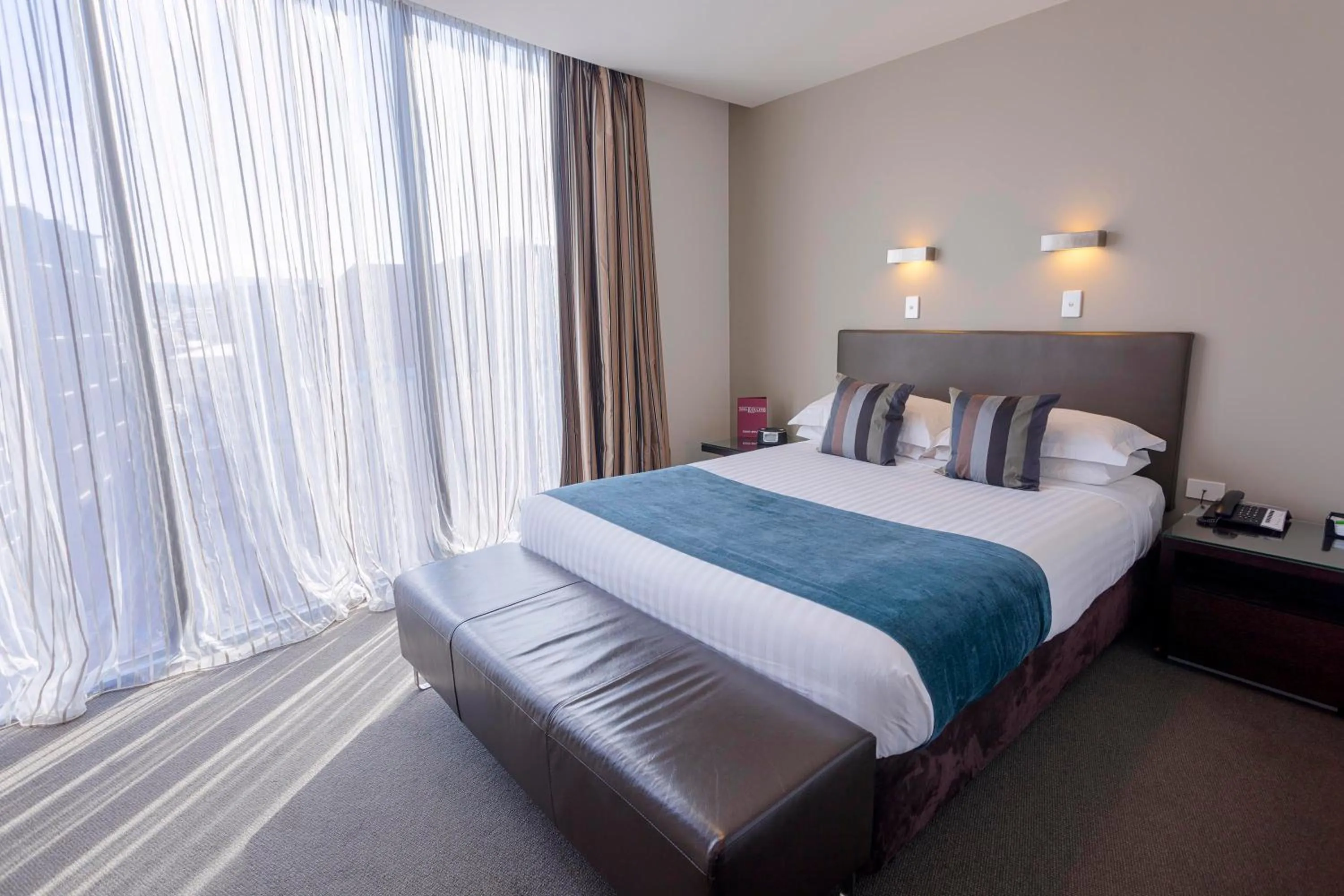 Bedroom, Bed in Mantra Collins Hotel