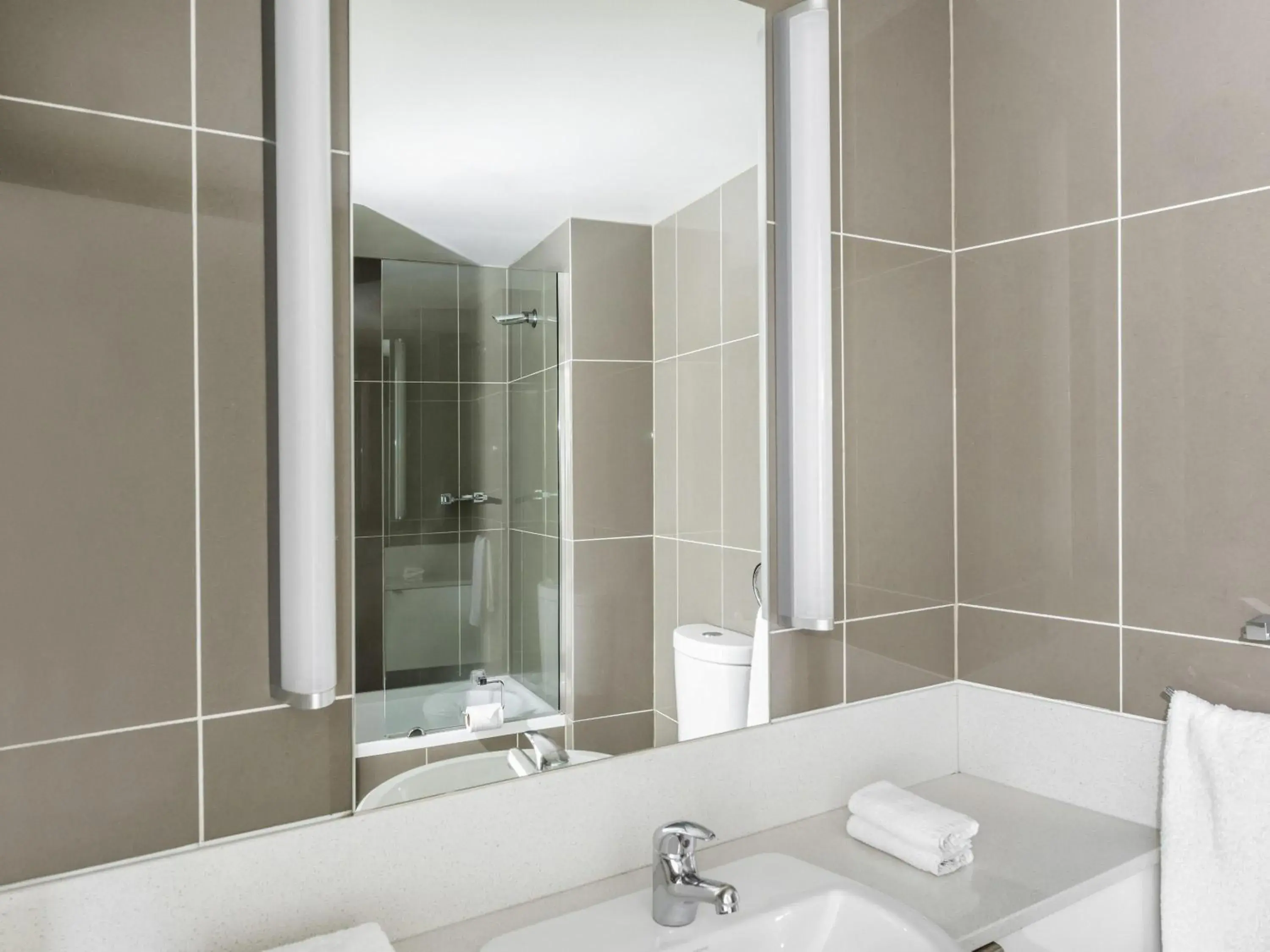 Bedroom in Mantra Collins Hotel Bedroom in Mantra Collins Hotel