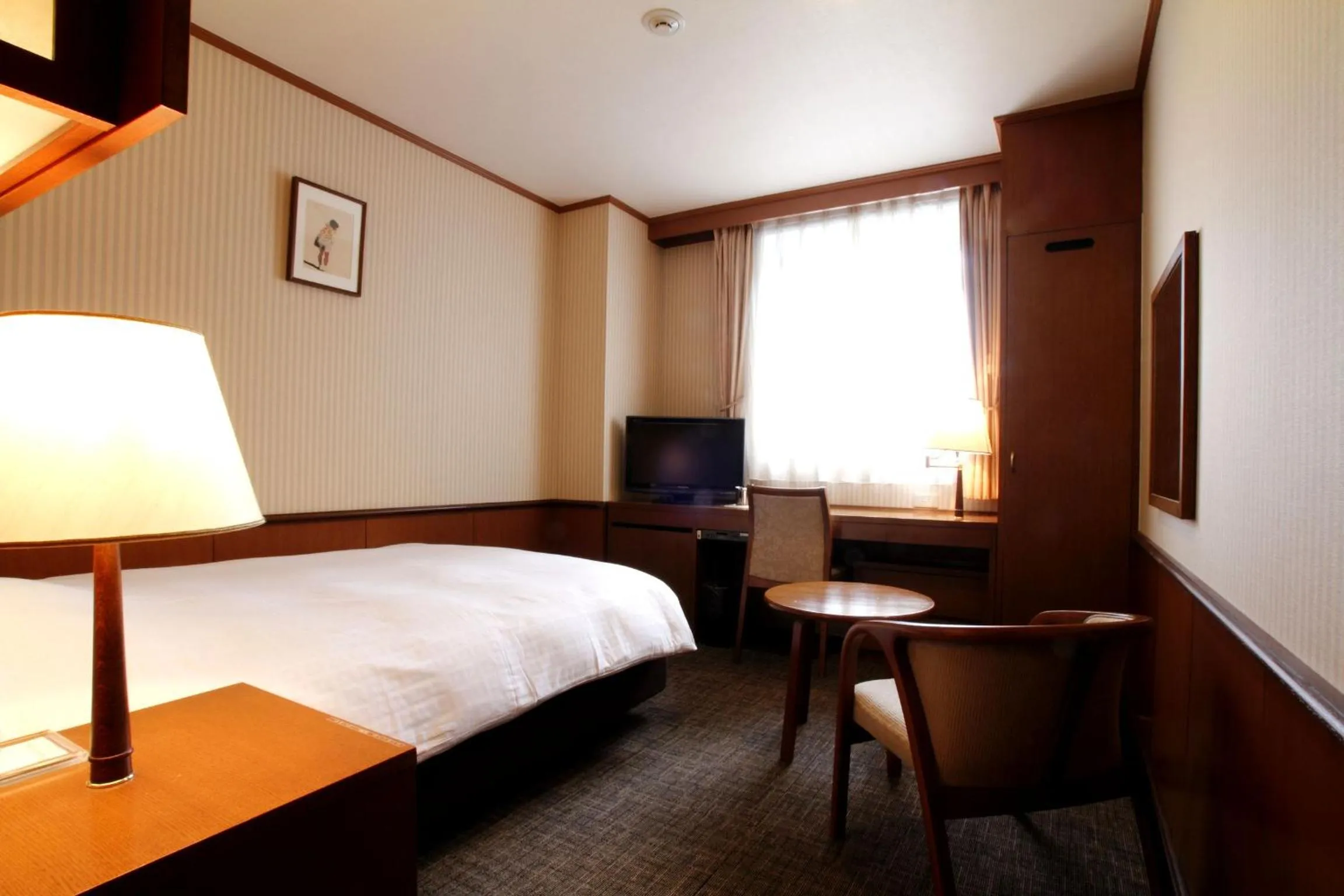 Bed in Daiichi Inn Park