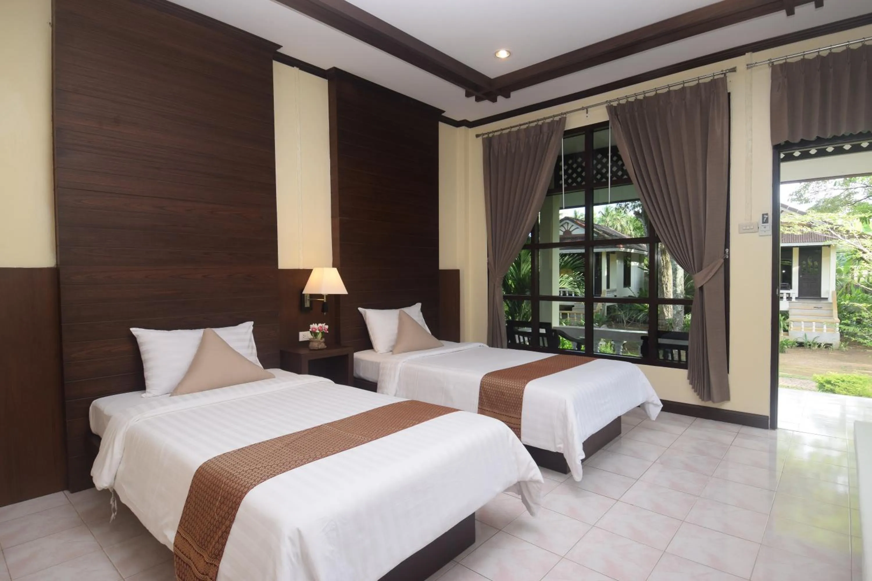 Bed in Clean Beach Resort